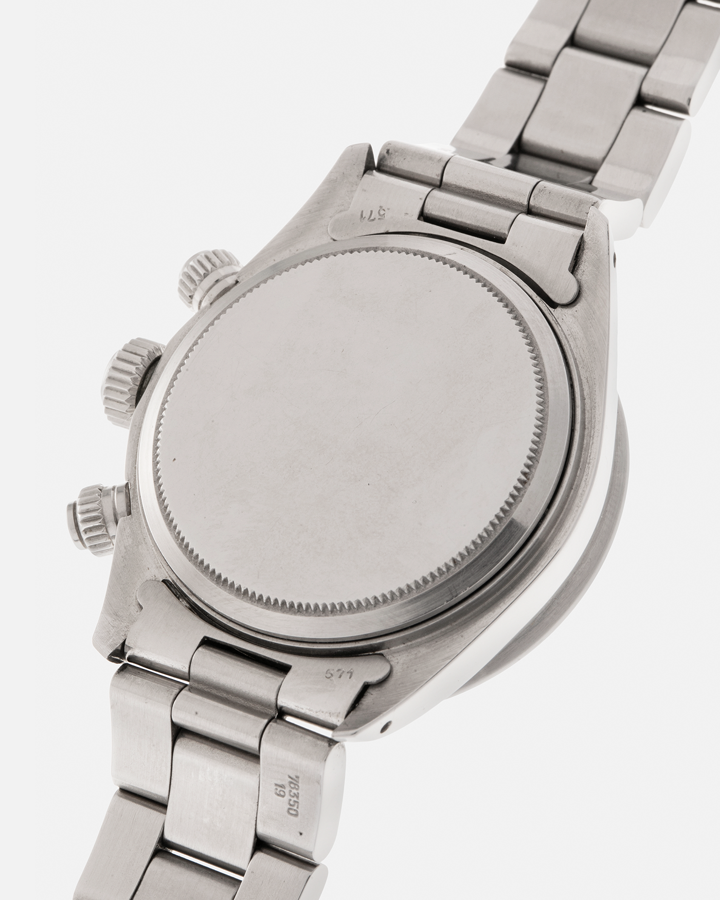 Brand: Rolex
Year: 1979
Model: Cosmograph Daytona ‘Big Red’
Serial Number: 584XXXX
Reference Number: 6263
Material: Stainless Steel
Movement: Rolex-Signed Valjoux Cal. 727, Manual-Winding
Case Dimensions: 37.5mm x 13.5mm (Lug-to-Lug 45mm)
Lug Width: 19mm
Bracelet: Rolex 78350 Solid Link Oyster Bracelet in Stainless Steel with Signed Clasp