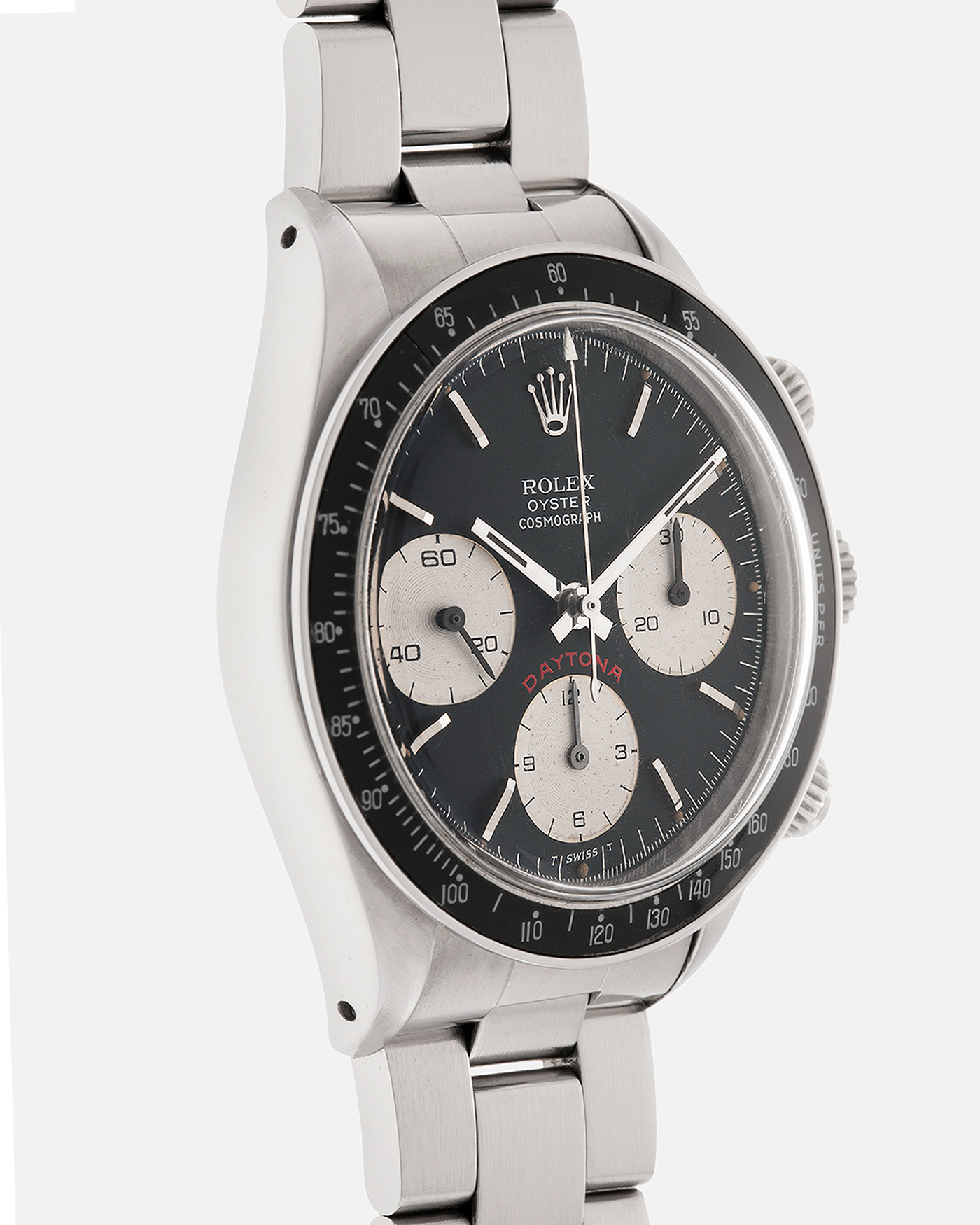 Brand: Rolex
Year: 1979
Model: Cosmograph Daytona ‘Big Red’
Serial Number: 584XXXX
Reference Number: 6263
Material: Stainless Steel
Movement: Rolex-Signed Valjoux Cal. 727, Manual-Winding
Case Dimensions: 37.5mm x 13.5mm (Lug-to-Lug 45mm)
Lug Width: 19mm
Bracelet: Rolex 78350 Solid Link Oyster Bracelet in Stainless Steel with Signed Clasp