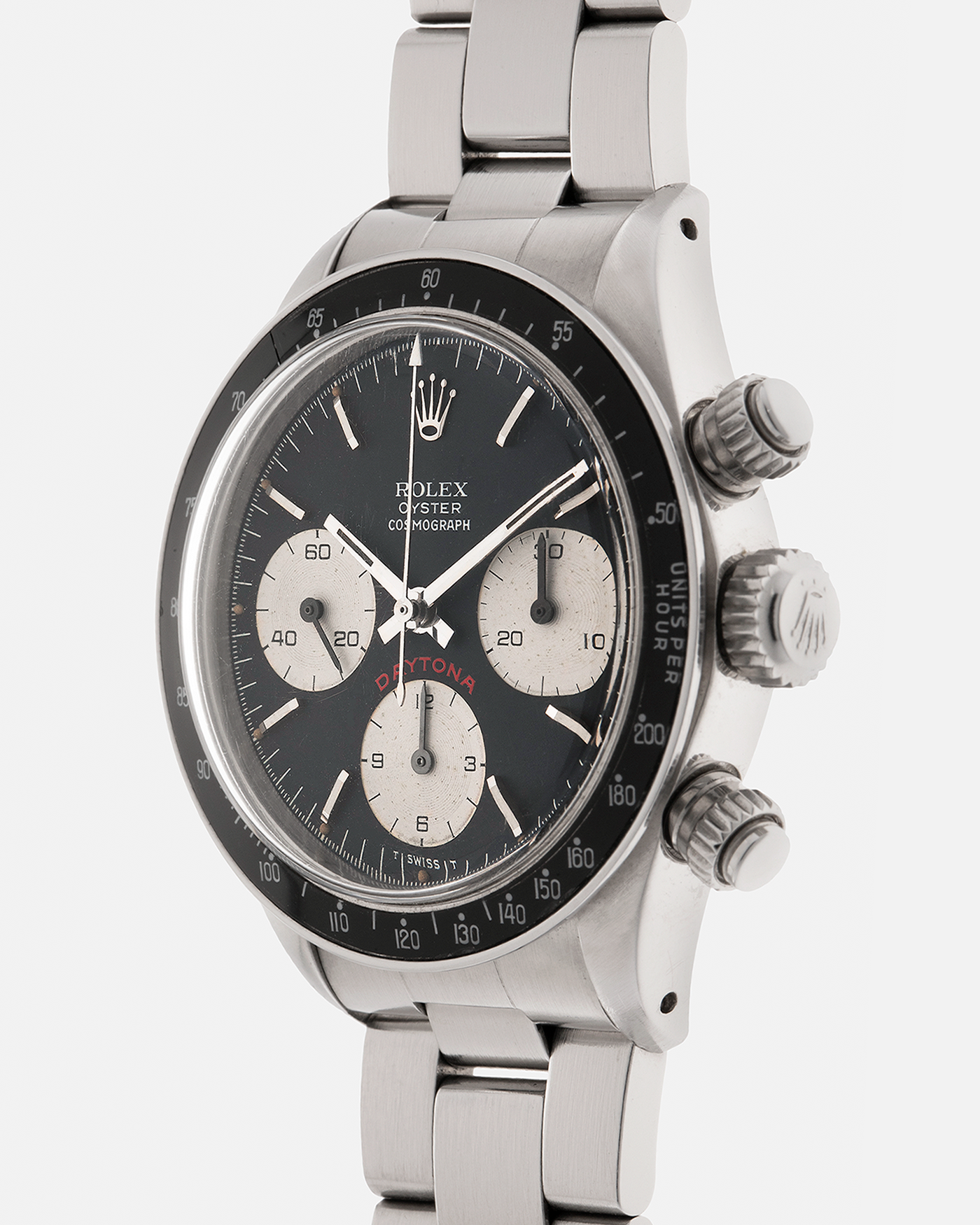 Brand: Rolex
Year: 1979
Model: Cosmograph Daytona ‘Big Red’
Serial Number: 584XXXX
Reference Number: 6263
Material: Stainless Steel
Movement: Rolex-Signed Valjoux Cal. 727, Manual-Winding
Case Dimensions: 37.5mm x 13.5mm (Lug-to-Lug 45mm)
Lug Width: 19mm
Bracelet: Rolex 78350 Solid Link Oyster Bracelet in Stainless Steel with Signed Clasp