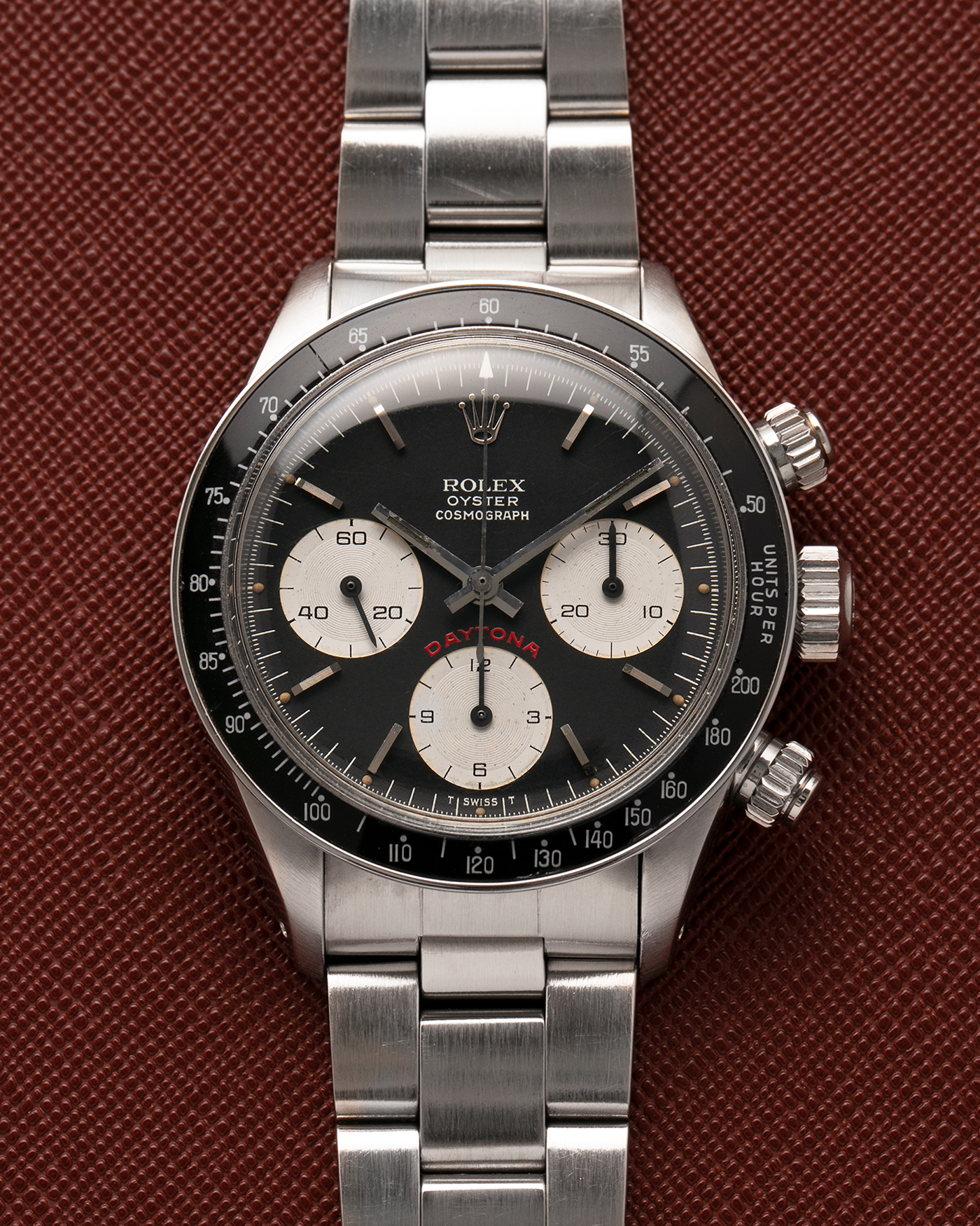 Brand: Rolex
Year: 1979
Model: Cosmograph Daytona ‘Big Red’
Serial Number: 584XXXX
Reference Number: 6263
Material: Stainless Steel
Movement: Rolex-Signed Valjoux Cal. 727, Manual-Winding
Case Dimensions: 37.5mm x 13.5mm (Lug-to-Lug 45mm)
Lug Width: 19mm
Bracelet: Rolex 78350 Solid Link Oyster Bracelet in Stainless Steel with Signed Clasp
