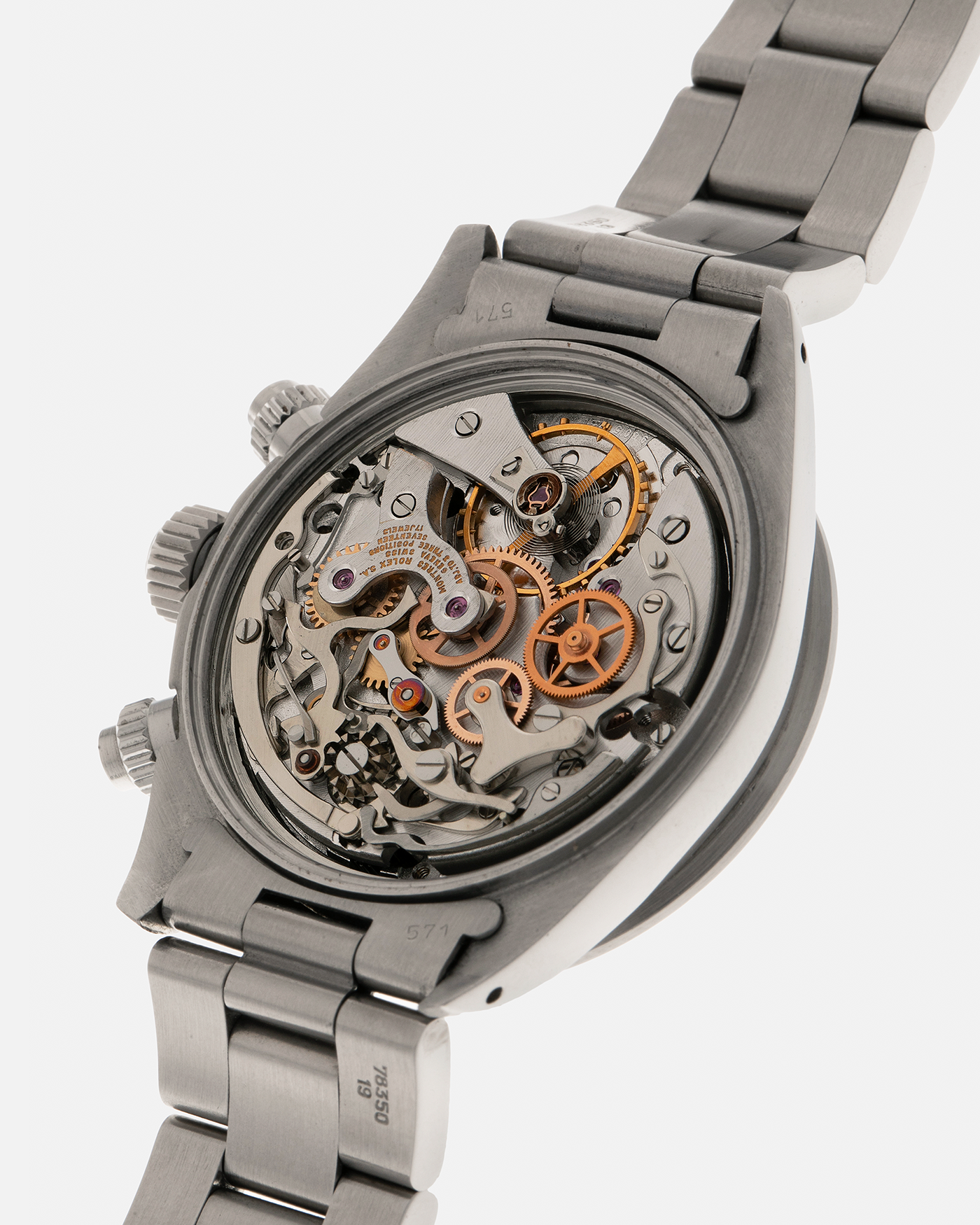 Brand: Rolex
Year: 1979
Model: Cosmograph Daytona ‘Big Red’
Serial Number: 629XXXX
Reference Number: 6263
Material: Stainless Steel
Movement: Rolex-Signed Valjoux Cal. 727, Manual-Winding
Case Dimensions: 37.5mm x 13.5mm (Lug-to-Lug 45mm)
Lug Width: 19mm
Bracelet: Rolex 78350 Solid Link Oyster Bracelet in Stainless Steel with ‘571’ Curved End Links and ‘F’ Signed Clasp