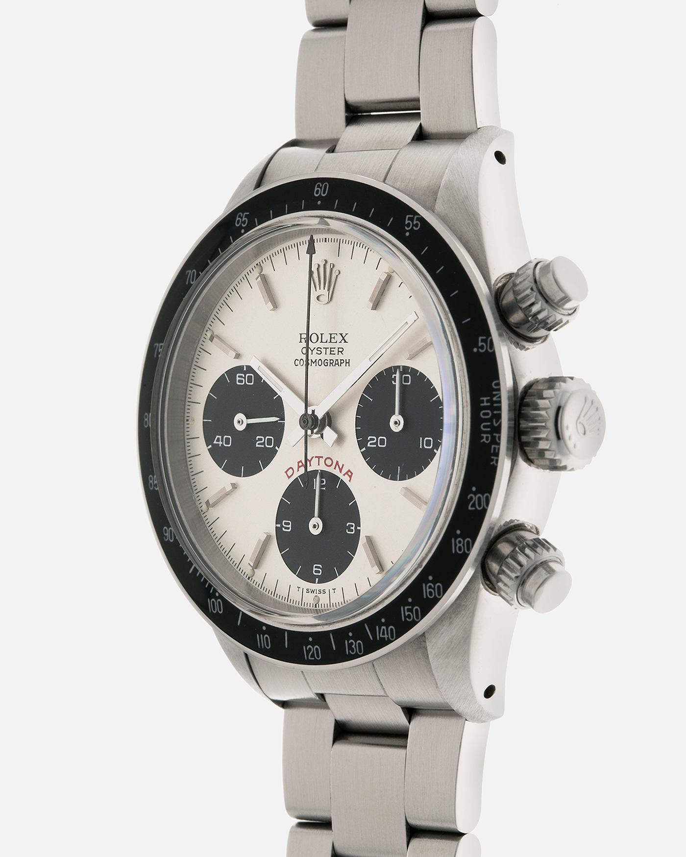 Brand: Rolex
Year: 1979
Model: Cosmograph Daytona ‘Big Red’
Serial Number: 629XXXX
Reference Number: 6263
Material: Stainless Steel
Movement: Rolex-Signed Valjoux Cal. 727, Manual-Winding
Case Dimensions: 37.5mm x 13.5mm (Lug-to-Lug 45mm)
Lug Width: 19mm
Bracelet: Rolex 78350 Solid Link Oyster Bracelet in Stainless Steel with ‘571’ Curved End Links and ‘F’ Signed Clasp