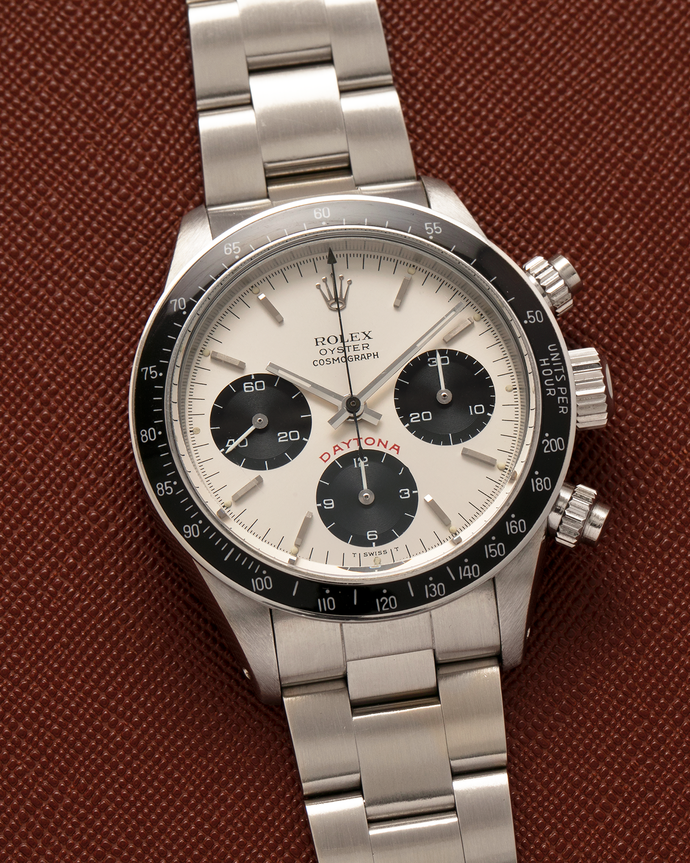 Brand: Rolex
Year: 1979
Model: Cosmograph Daytona ‘Big Red’
Serial Number: 629XXXX
Reference Number: 6263
Material: Stainless Steel
Movement: Rolex-Signed Valjoux Cal. 727, Manual-Winding
Case Dimensions: 37.5mm x 13.5mm (Lug-to-Lug 45mm)
Lug Width: 19mm
Bracelet: Rolex 78350 Solid Link Oyster Bracelet in Stainless Steel with ‘571’ Curved End Links and ‘F’ Signed Clasp