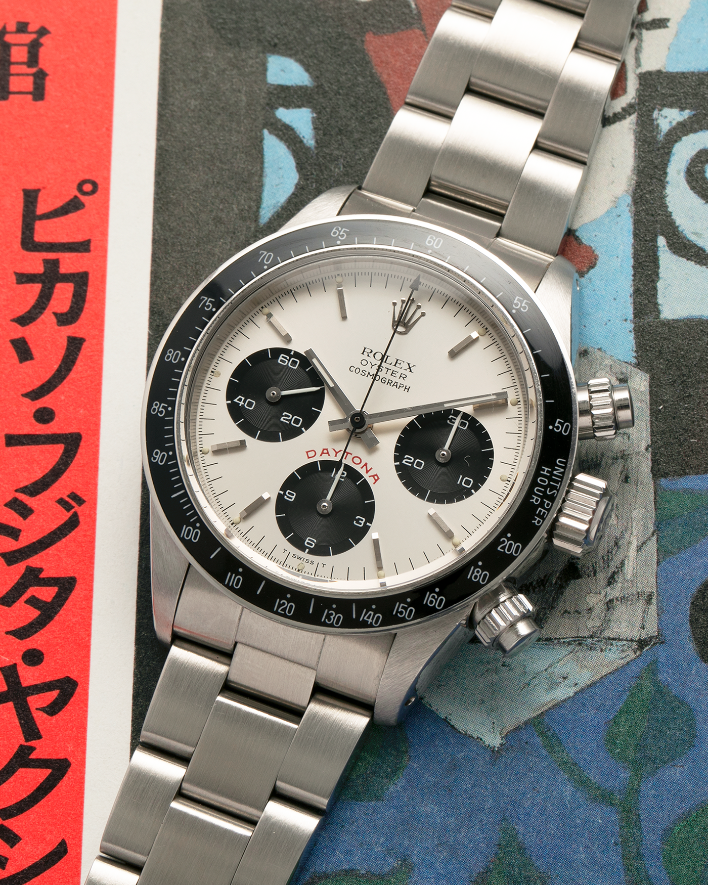 Brand: Rolex
Year: 1979
Model: Cosmograph Daytona ‘Big Red’
Serial Number: 629XXXX
Reference Number: 6263
Material: Stainless Steel
Movement: Rolex-Signed Valjoux Cal. 727, Manual-Winding
Case Dimensions: 37.5mm x 13.5mm (Lug-to-Lug 45mm)
Lug Width: 19mm
Bracelet: Rolex 78350 Solid Link Oyster Bracelet in Stainless Steel with ‘571’ Curved End Links and ‘F’ Signed Clasp