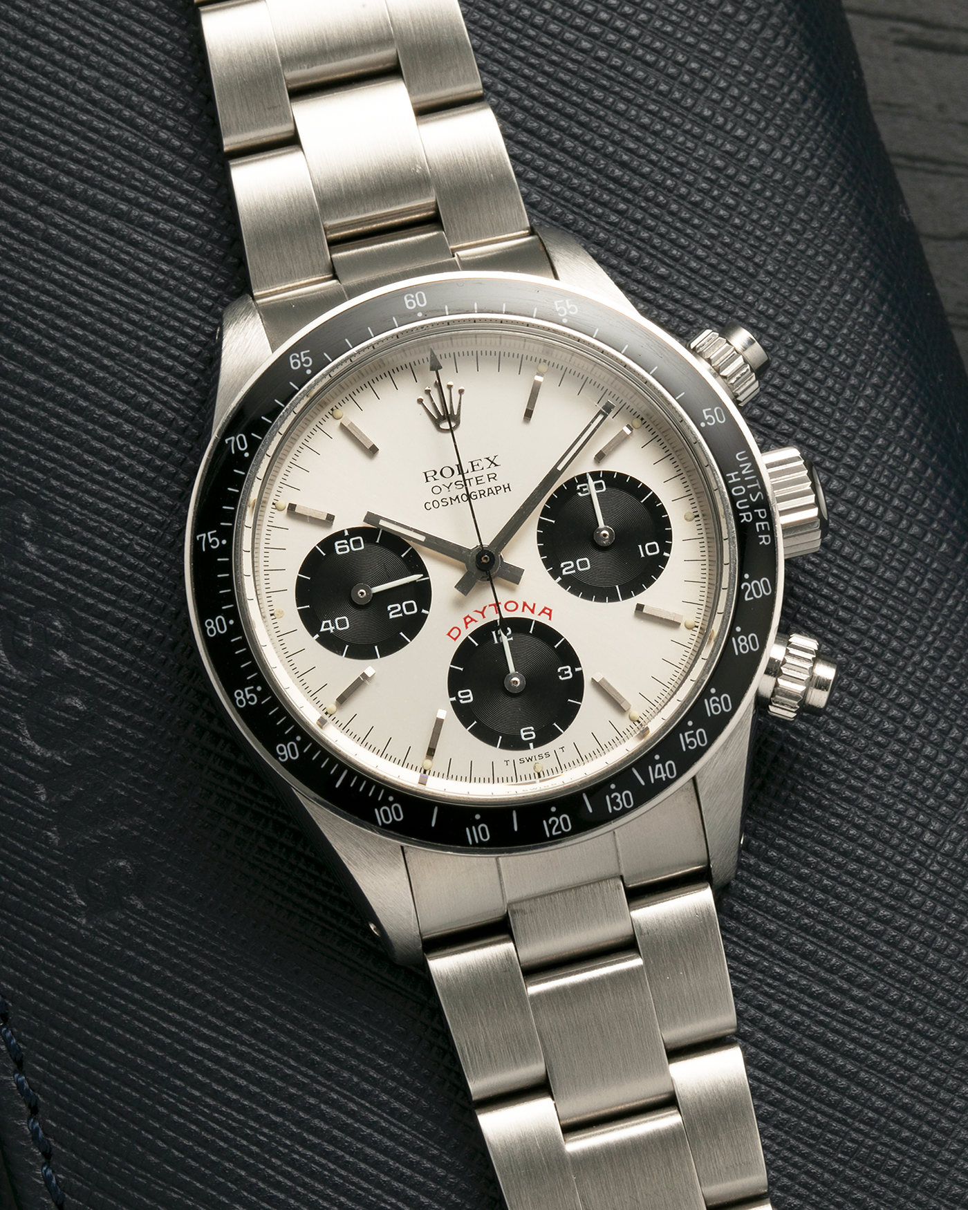 Brand: Rolex
Year: 1979
Model: Cosmograph Daytona ‘Big Red’
Serial Number: 629XXXX
Reference Number: 6263
Material: Stainless Steel
Movement: Rolex-Signed Valjoux Cal. 727, Manual-Winding
Case Dimensions: 37.5mm x 13.5mm (Lug-to-Lug 45mm)
Lug Width: 19mm
Bracelet: Rolex 78350 Solid Link Oyster Bracelet in Stainless Steel with ‘571’ Curved End Links and ‘F’ Signed Clasp