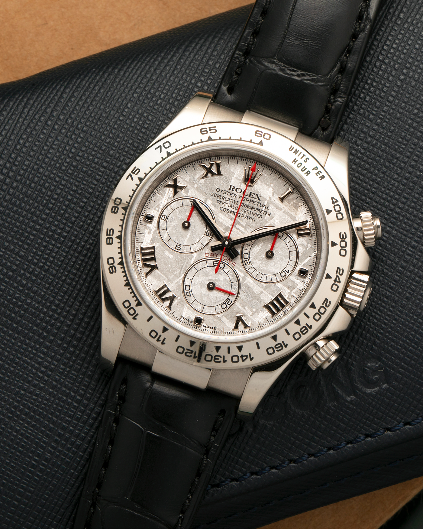 Brand: Rolex
Year: 2009
Model: Cosmograph Daytona ‘Meteorite’
Reference Number: 116519
Serial Number: Z946XXX
Material: 18-carat White Gold
Movement: Rolex Cal. 4130, Self-Winding
Case Diameter: 40mm x 11mm (Lug-to-Lug 47.5mm)
Lug Width: 20mm
Strap: Rolex Black ‘336506’ Leather Strap with 18-carat White Gold Signed ‘24650’ Deployant Clasp