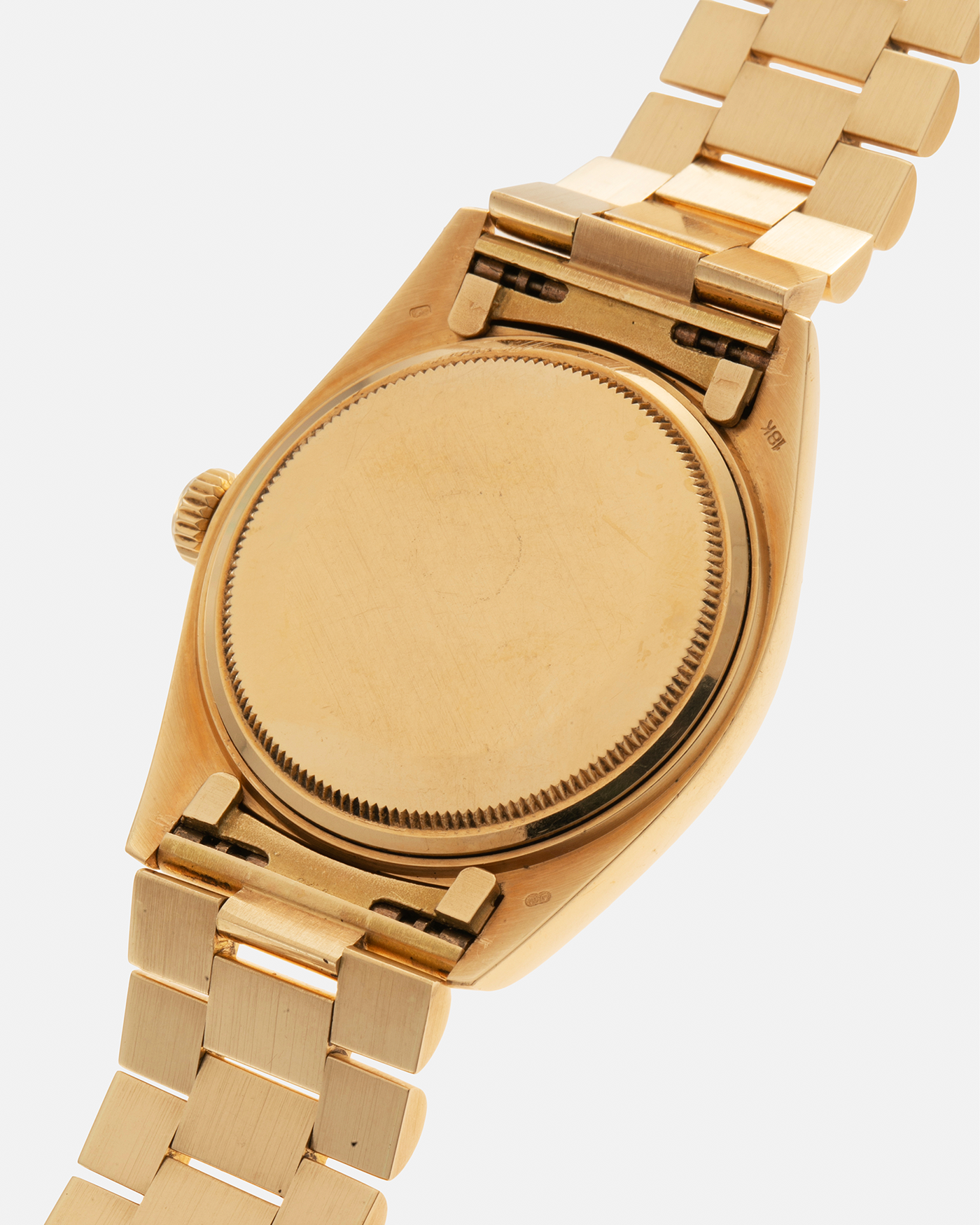 Brand: Rolex Year: 1976 Model: Datejust Reference Number: 1601 Serial Number: 420XXXX Material: 18-carat Yellow Gold, Malachite Stone Dial Movement: Rolex Cal. 1570, Self-Winding Case Diameter: 36mm Lug Width: 20mm Bracelet: Rolex Presidential Bracelet in 18-carat Yellow Gold with Signed Clasp