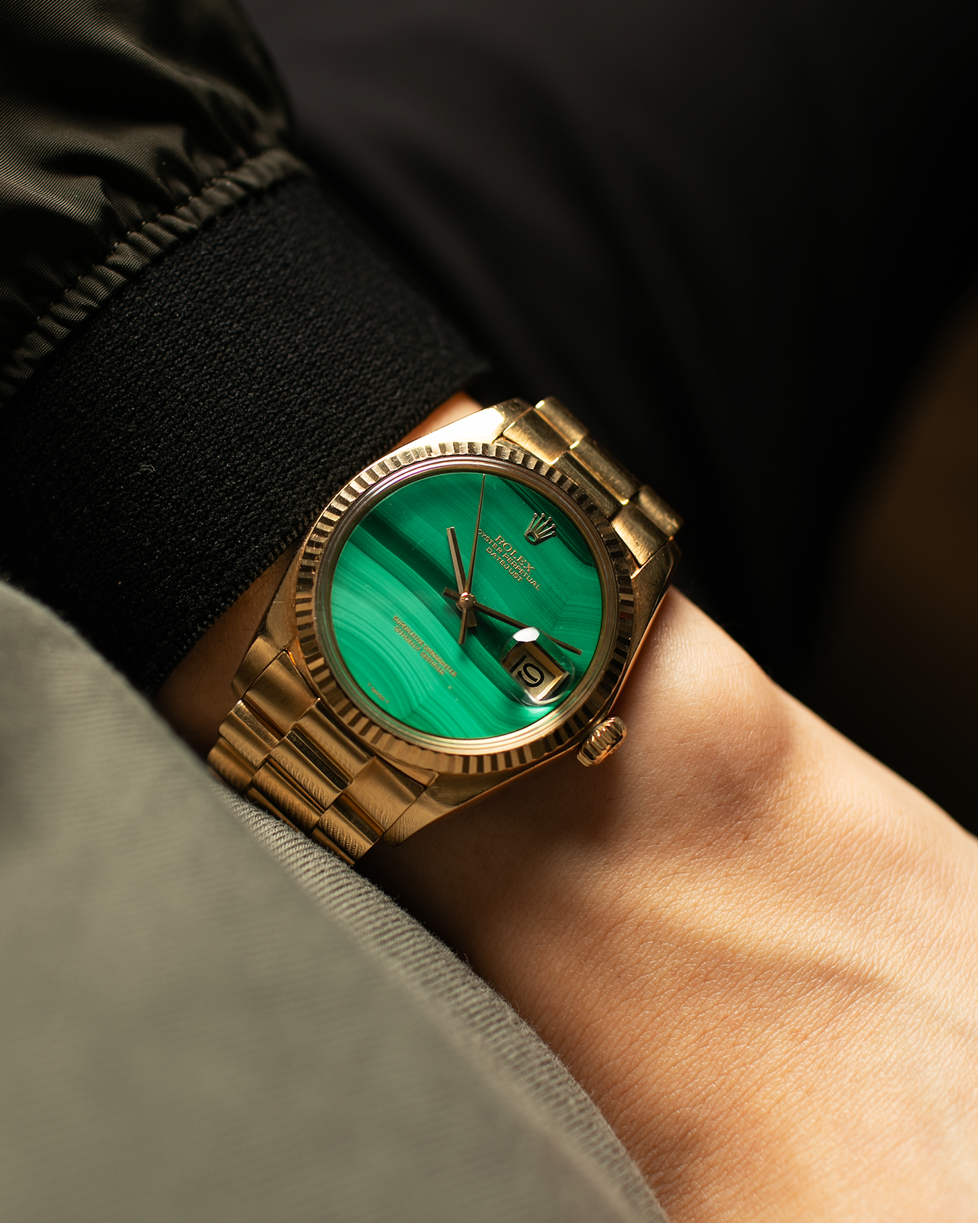 Brand: Rolex Year: 1976 Model: Datejust Reference Number: 1601 Serial Number: 420XXXX Material: 18-carat Yellow Gold, Malachite Stone Dial Movement: Rolex Cal. 1570, Self-Winding Case Diameter: 36mm Lug Width: 20mm Bracelet: Rolex Presidential Bracelet in 18-carat Yellow Gold with Signed Clasp