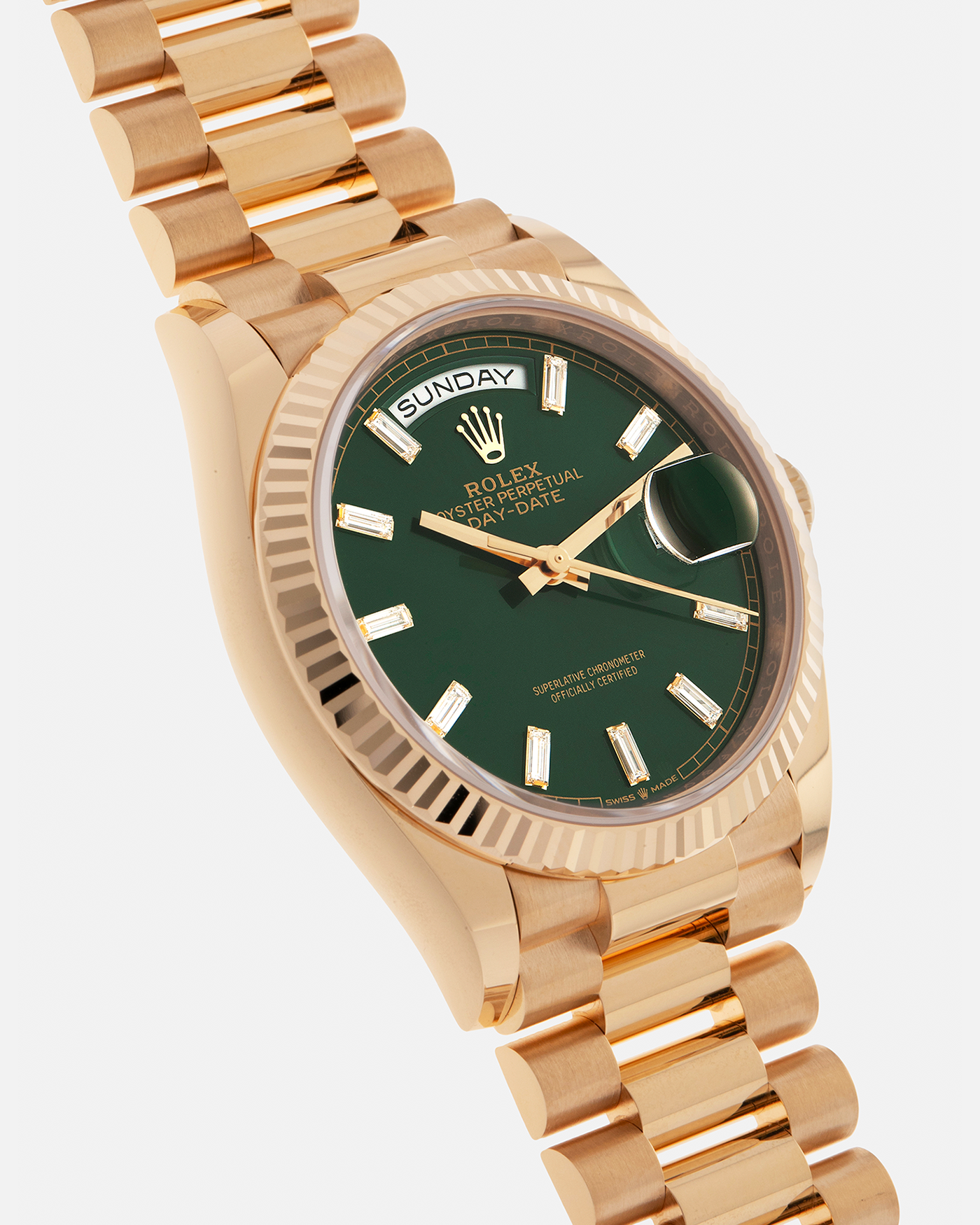 Brand: Rolex
Year: 2024
Model: Day-Date 36 ‘Baguette Diamonds’
Reference Number: 128238
Material: 18-carat Yellow Gold Case, Factory Set Baguette Diamond Hour Markers
Movement: Rolex Cal. 3255, Self-Winding
Case Dimensions: 36mm x 12mm (Lug-to-Lug 43mm)
Lug Width: 20mm
Bracelet: Rolex Presidential Bracelet in 18-carat Yellow Gold with Signed Folding Clasp