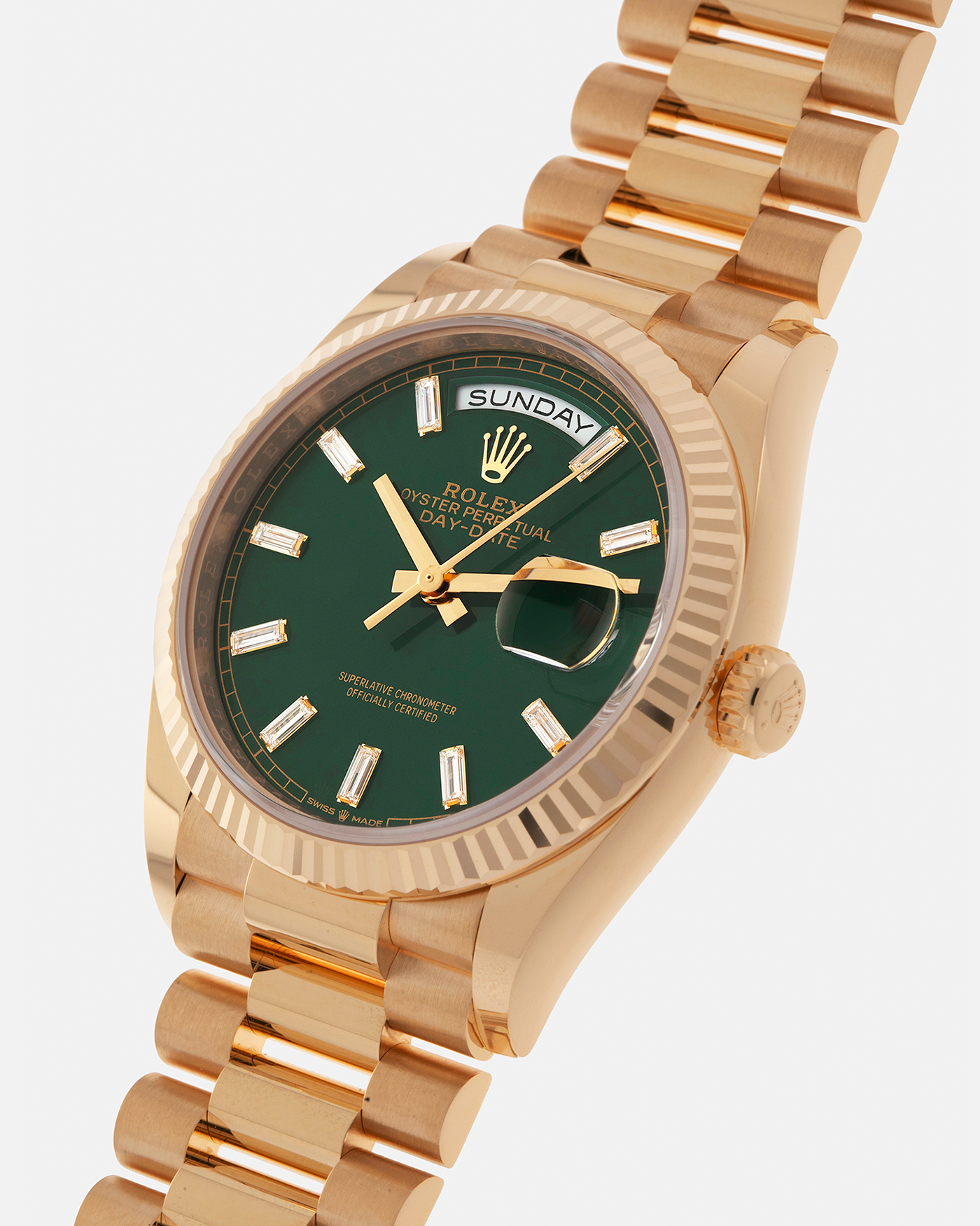 Brand: Rolex
Year: 2024
Model: Day-Date 36 ‘Baguette Diamonds’
Reference Number: 128238
Material: 18-carat Yellow Gold Case, Factory Set Baguette Diamond Hour Markers
Movement: Rolex Cal. 3255, Self-Winding
Case Dimensions: 36mm x 12mm (Lug-to-Lug 43mm)
Lug Width: 20mm
Bracelet: Rolex Presidential Bracelet in 18-carat Yellow Gold with Signed Folding Clasp