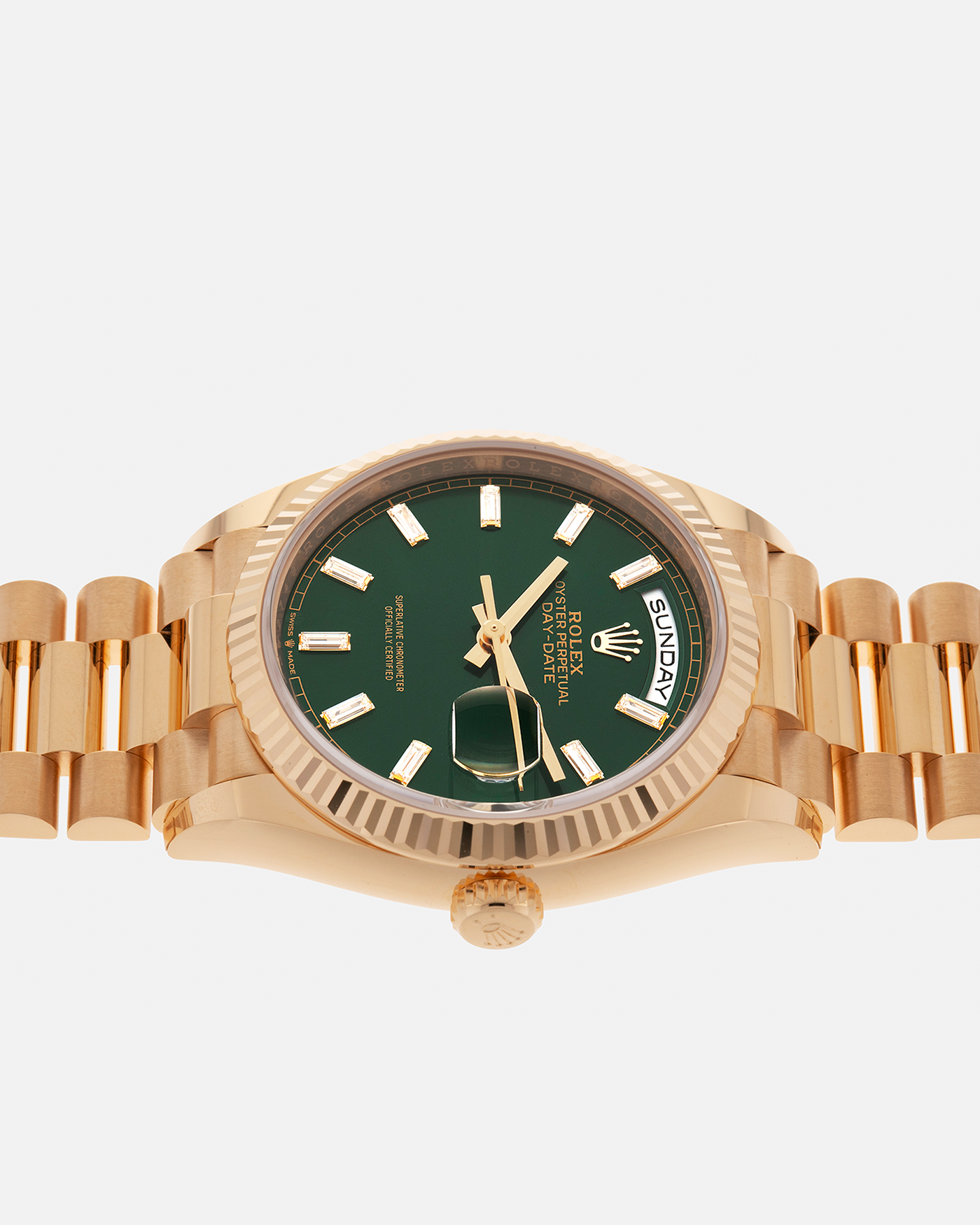 Brand: Rolex
Year: 2024
Model: Day-Date 36 ‘Baguette Diamonds’
Reference Number: 128238
Material: 18-carat Yellow Gold Case, Factory Set Baguette Diamond Hour Markers
Movement: Rolex Cal. 3255, Self-Winding
Case Dimensions: 36mm x 12mm (Lug-to-Lug 43mm)
Lug Width: 20mm
Bracelet: Rolex Presidential Bracelet in 18-carat Yellow Gold with Signed Folding Clasp
