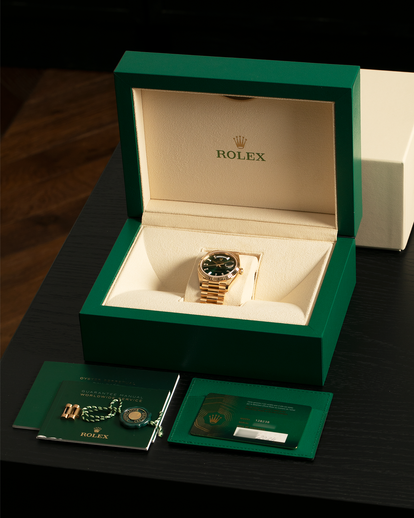Brand: Rolex
Year: 2024
Model: Day-Date 36 ‘Baguette Diamonds’
Reference Number: 128238
Material: 18-carat Yellow Gold Case, Factory Set Baguette Diamond Hour Markers
Movement: Rolex Cal. 3255, Self-Winding
Case Dimensions: 36mm x 12mm (Lug-to-Lug 43mm)
Lug Width: 20mm
Bracelet: Rolex Presidential Bracelet in 18-carat Yellow Gold with Signed Folding Clasp