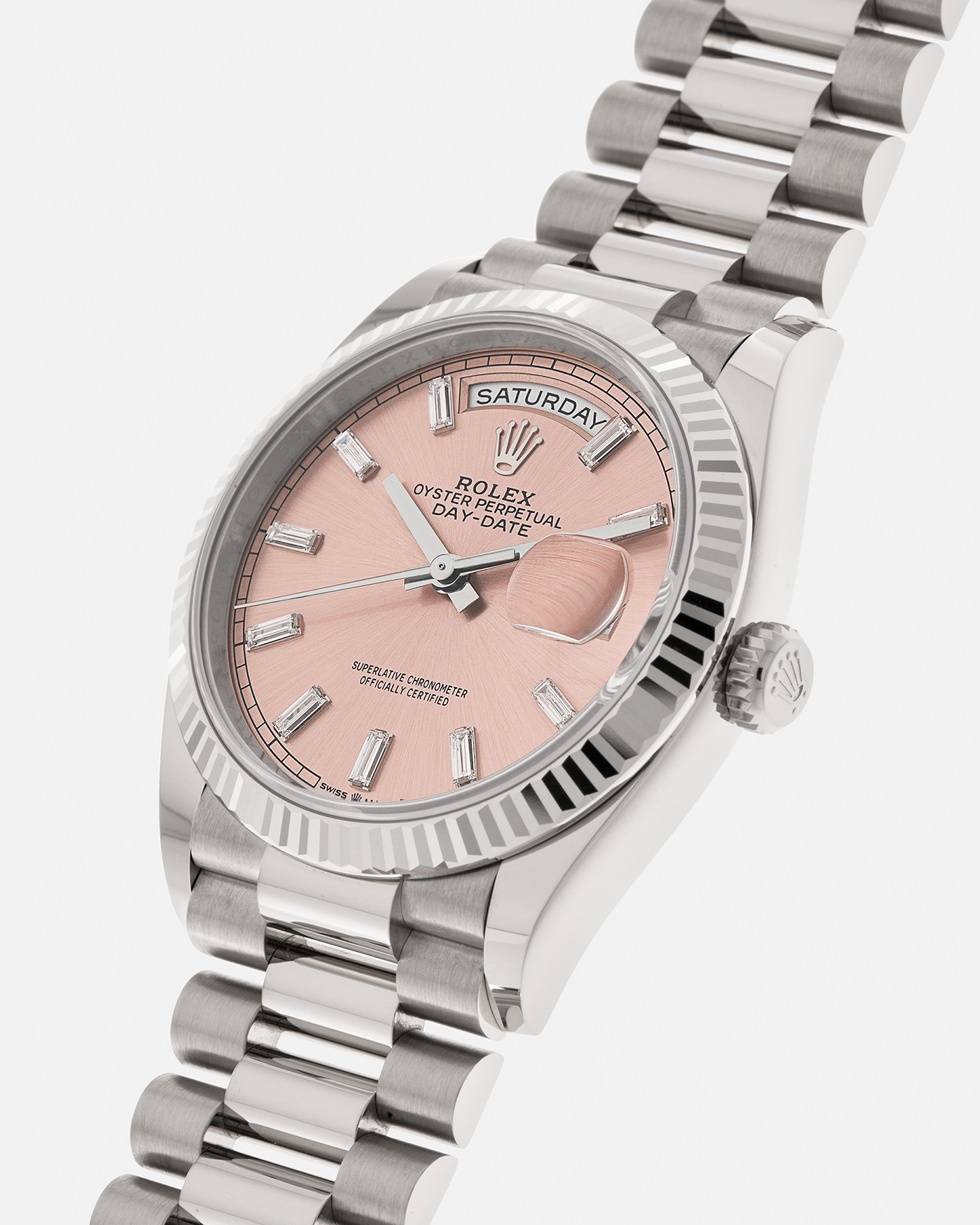 Brand: Rolex
Year: 2025
Model: Day-Date 36 ‘Baguette Diamonds’
Reference Number: 128239
Material: 18-carat White Gold Case, Factory Set Baguette Diamond Hour Markers
Movement: Rolex Cal. 3255, Self-Winding
Case Dimensions: 36mm x 12mm (Lug-to-Lug 43mm)
Lug Width: 20mm
Bracelet: Rolex Presidential Bracelet in 18-carat White Gold with Signed Folding Clasp