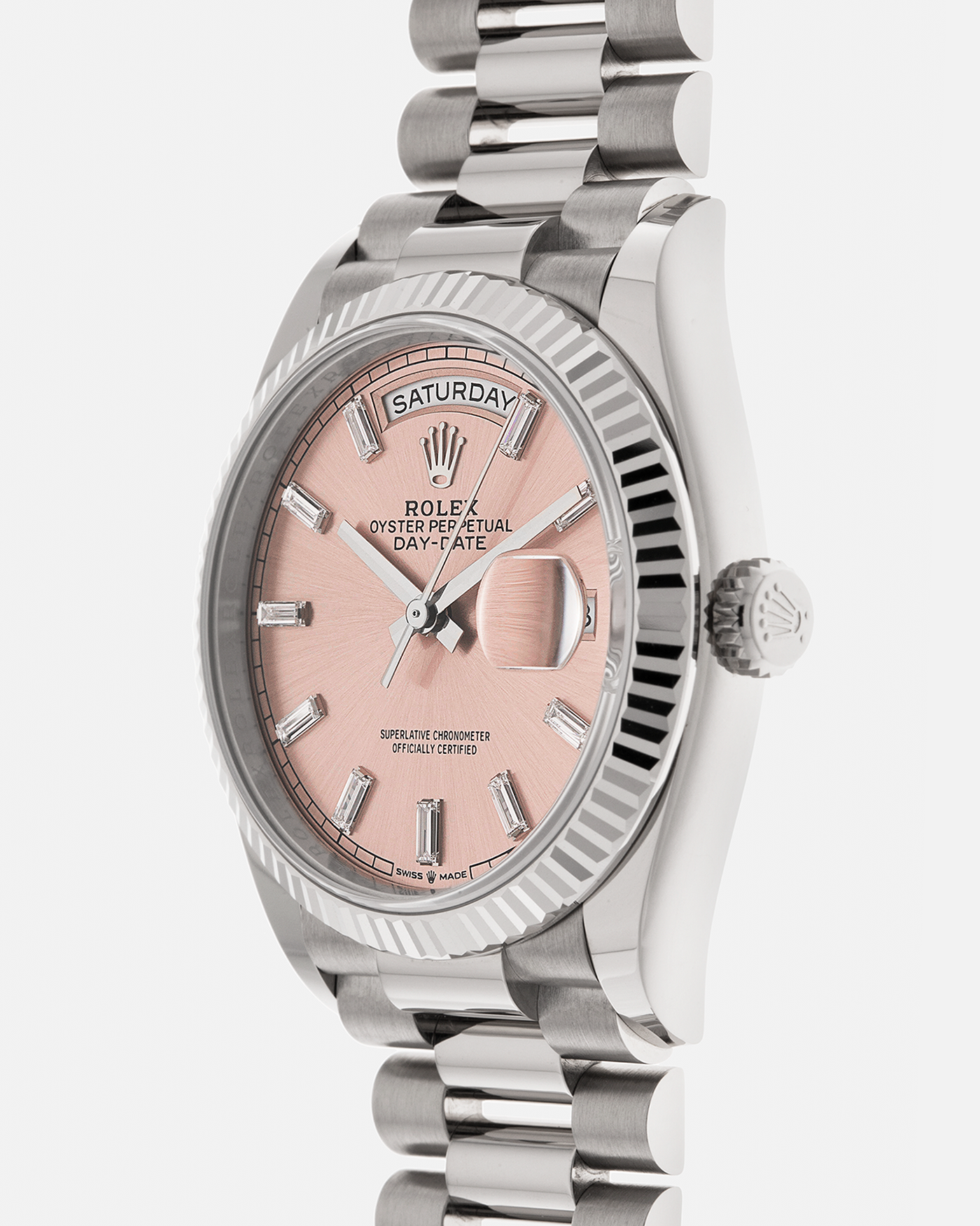 Brand: Rolex
Year: 2025
Model: Day-Date 36 ‘Baguette Diamonds’
Reference Number: 128239
Material: 18-carat White Gold Case, Factory Set Baguette Diamond Hour Markers
Movement: Rolex Cal. 3255, Self-Winding
Case Dimensions: 36mm x 12mm (Lug-to-Lug 43mm)
Lug Width: 20mm
Bracelet: Rolex Presidential Bracelet in 18-carat White Gold with Signed Folding Clasp