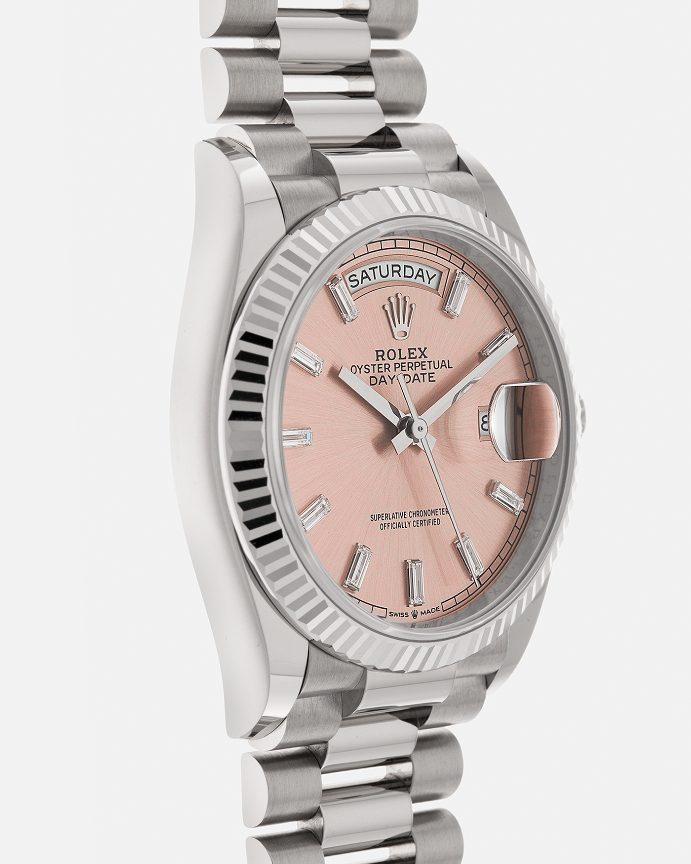 Brand: Rolex
Year: 2025
Model: Day-Date 36 ‘Baguette Diamonds’
Reference Number: 128239
Material: 18-carat White Gold Case, Factory Set Baguette Diamond Hour Markers
Movement: Rolex Cal. 3255, Self-Winding
Case Dimensions: 36mm x 12mm (Lug-to-Lug 43mm)
Lug Width: 20mm
Bracelet: Rolex Presidential Bracelet in 18-carat White Gold with Signed Folding Clasp