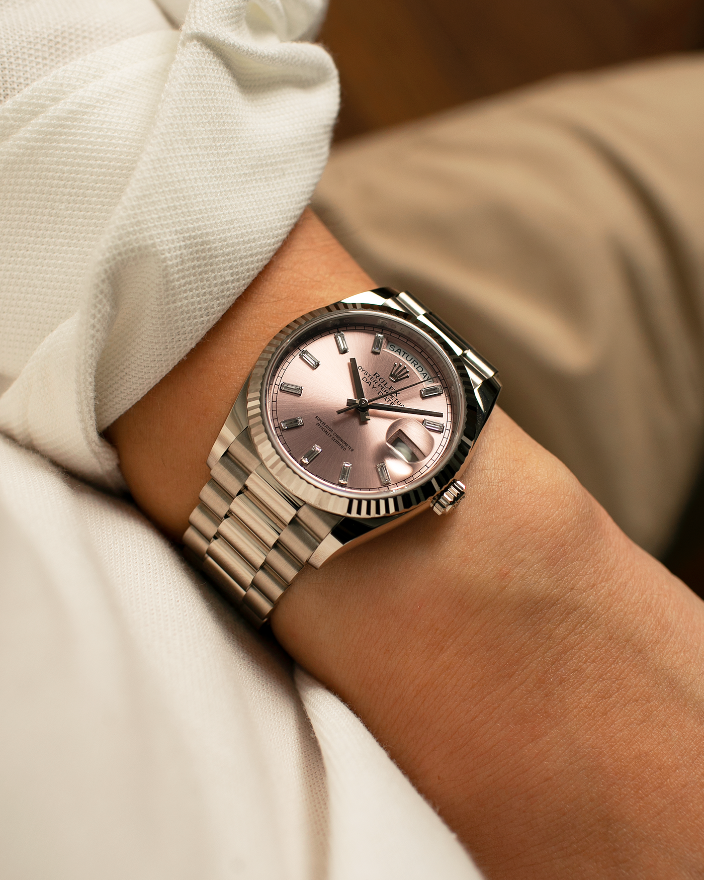 Brand: Rolex
Year: 2025
Model: Day-Date 36 ‘Baguette Diamonds’
Reference Number: 128239
Material: 18-carat White Gold Case, Factory Set Baguette Diamond Hour Markers
Movement: Rolex Cal. 3255, Self-Winding
Case Dimensions: 36mm x 12mm (Lug-to-Lug 43mm)
Lug Width: 20mm
Bracelet: Rolex Presidential Bracelet in 18-carat White Gold with Signed Folding Clasp