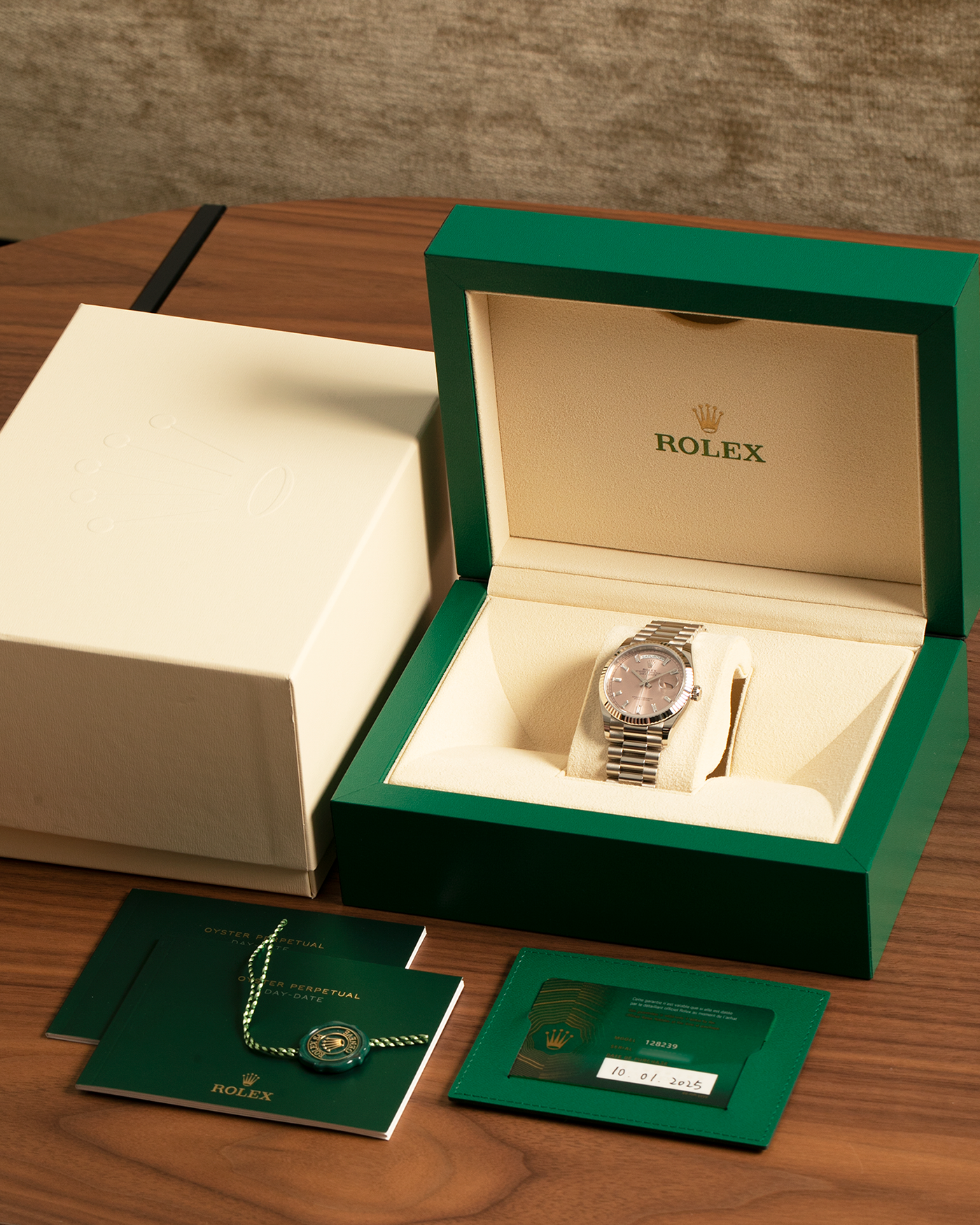 Brand: Rolex
Year: 2025
Model: Day-Date 36 ‘Baguette Diamonds’
Reference Number: 128239
Material: 18-carat White Gold Case, Factory Set Baguette Diamond Hour Markers
Movement: Rolex Cal. 3255, Self-Winding
Case Dimensions: 36mm x 12mm (Lug-to-Lug 43mm)
Lug Width: 20mm
Bracelet: Rolex Presidential Bracelet in 18-carat White Gold with Signed Folding Clasp