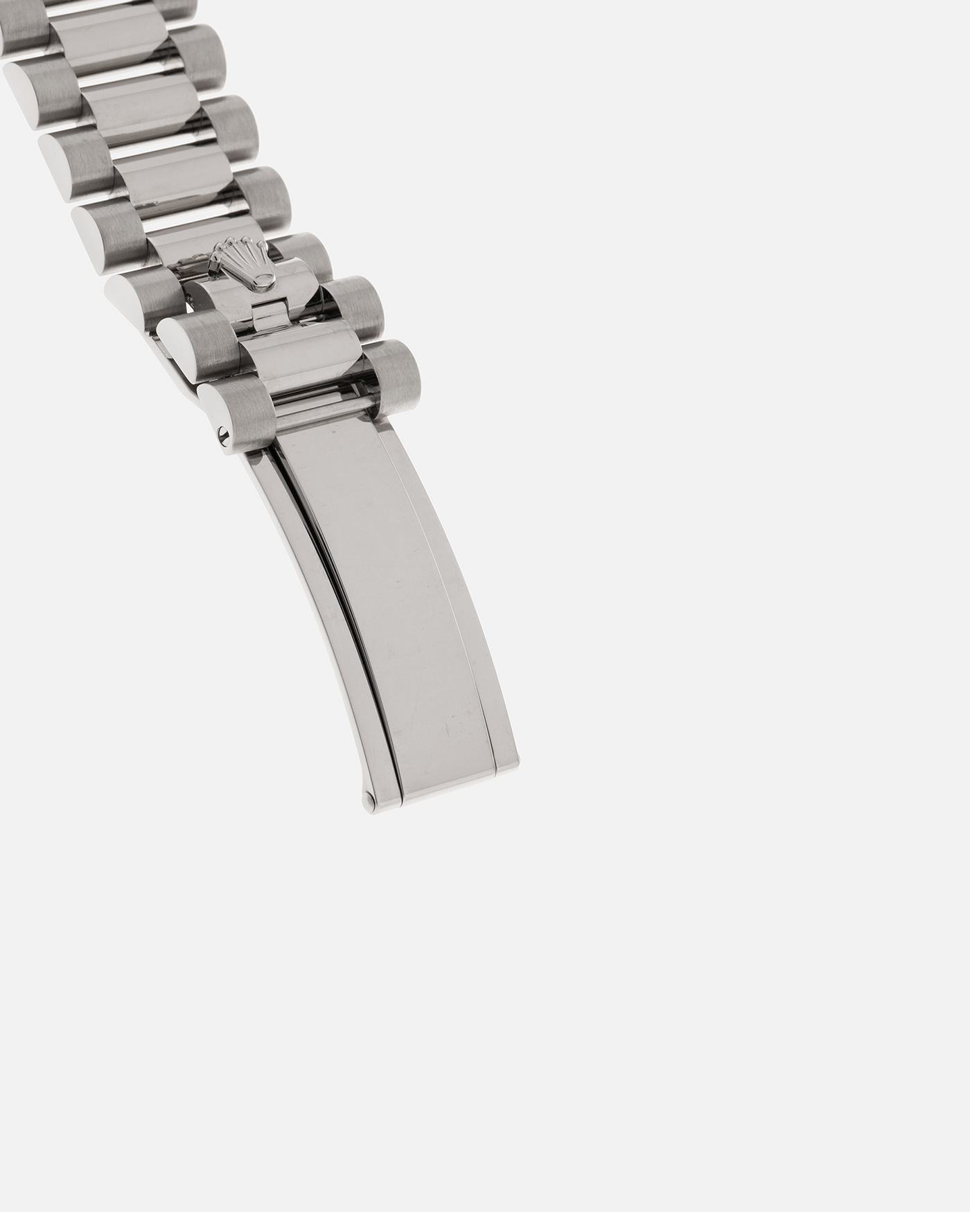 Brand: Rolex
Year: 2025
Model: Day-Date 36 ‘Baguette Diamonds’
Reference Number: 128239
Material: 18-carat White Gold Case, Factory Set Baguette Diamond Hour Markers
Movement: Rolex Cal. 3255, Self-Winding
Case Dimensions: 36mm x 12mm (Lug-to-Lug 43mm)
Lug Width: 20mm
Bracelet: Rolex Presidential Bracelet in 18-carat White Gold with Signed Folding Clasp