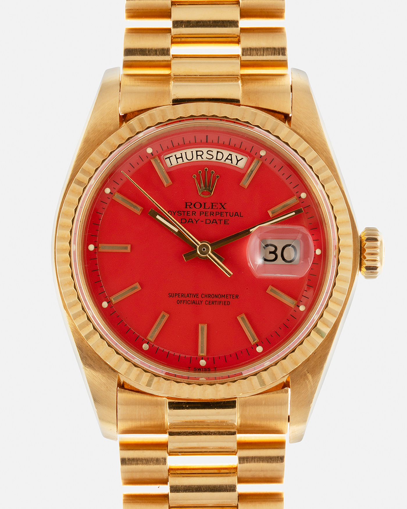 Brand: Rolex Year: 1978 Model: Day-Date, Coral Red ‘Stella’ Reference Number: 1803 Serial: 510XXXX Material: 18-carat Yellow Gold Movement: Rolex Cal. 1556, Self-Winding Case Diameter: 36mm Lug Width: 20mm Bracelet: Rolex 18-carat Yellow Gold ‘F18000’ Stamped Presidential Bracelet with ‘55’ Curved End Links