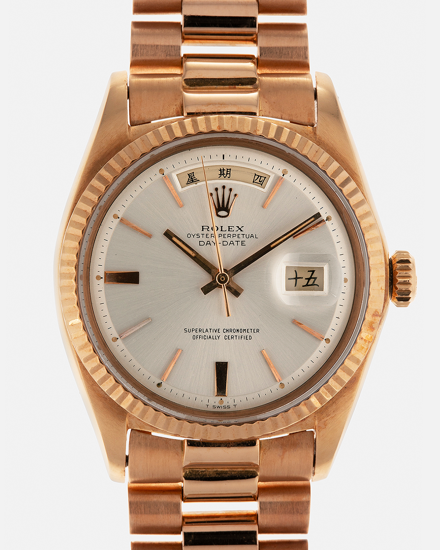 Brand: Rolex
Year: 1968
Model: Day-Date, ‘Doorstop’ Dial
Reference Number: 1803
Serial: 178XXXX
Material: 18-carat Rose Gold
Movement: Rolex Cal. 1556, Self-Winding
Case Dimensions: 36mm x 12.5mm (Lug-to-Lug 43mm)
Lug Width: 20mm
Bracelet: Rolex Presidential Bracelet in 18-carat Rose Gold with Signed Folding Clasp