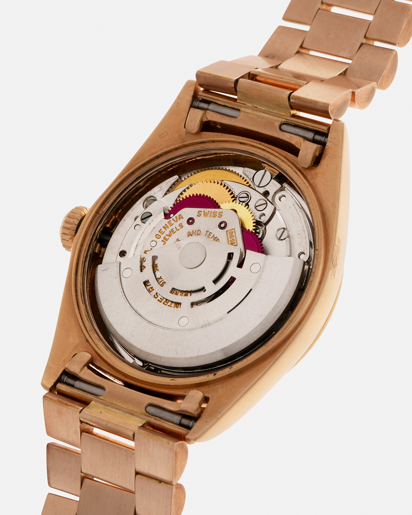 Brand: Rolex
Year: 1968
Model: Day-Date, ‘Doorstop’ Dial
Reference Number: 1803
Serial: 178XXXX
Material: 18-carat Rose Gold
Movement: Rolex Cal. 1556, Self-Winding
Case Dimensions: 36mm x 12.5mm (Lug-to-Lug 43mm)
Lug Width: 20mm
Bracelet: Rolex Presidential Bracelet in 18-carat Rose Gold with Signed Folding Clasp