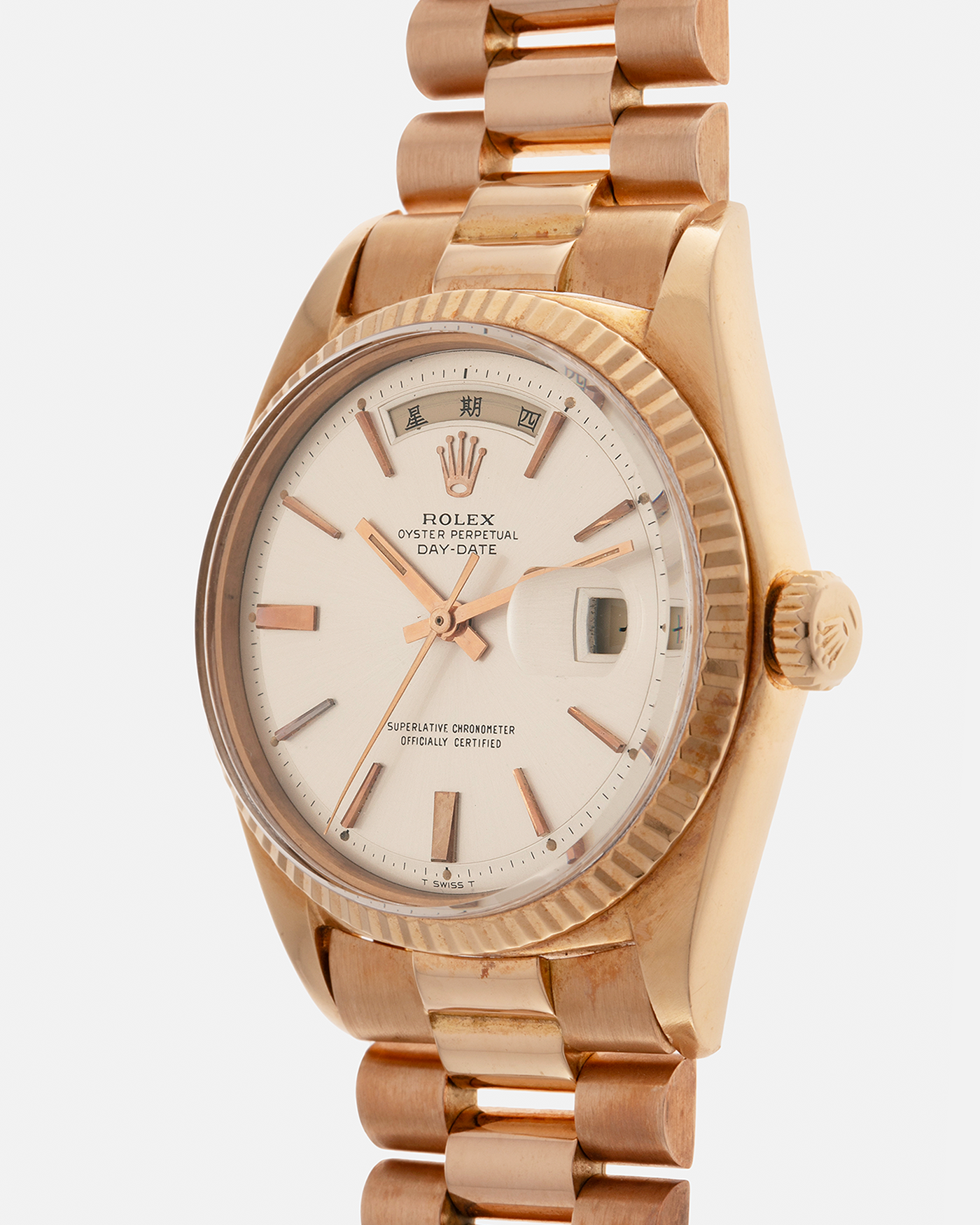 Brand: Rolex
Year: 1968
Model: Day-Date, ‘Doorstop’ Dial
Reference Number: 1803
Serial: 178XXXX
Material: 18-carat Rose Gold
Movement: Rolex Cal. 1556, Self-Winding
Case Dimensions: 36mm x 12.5mm (Lug-to-Lug 43mm)
Lug Width: 20mm
Bracelet: Rolex Presidential Bracelet in 18-carat Rose Gold with Signed Folding Clasp