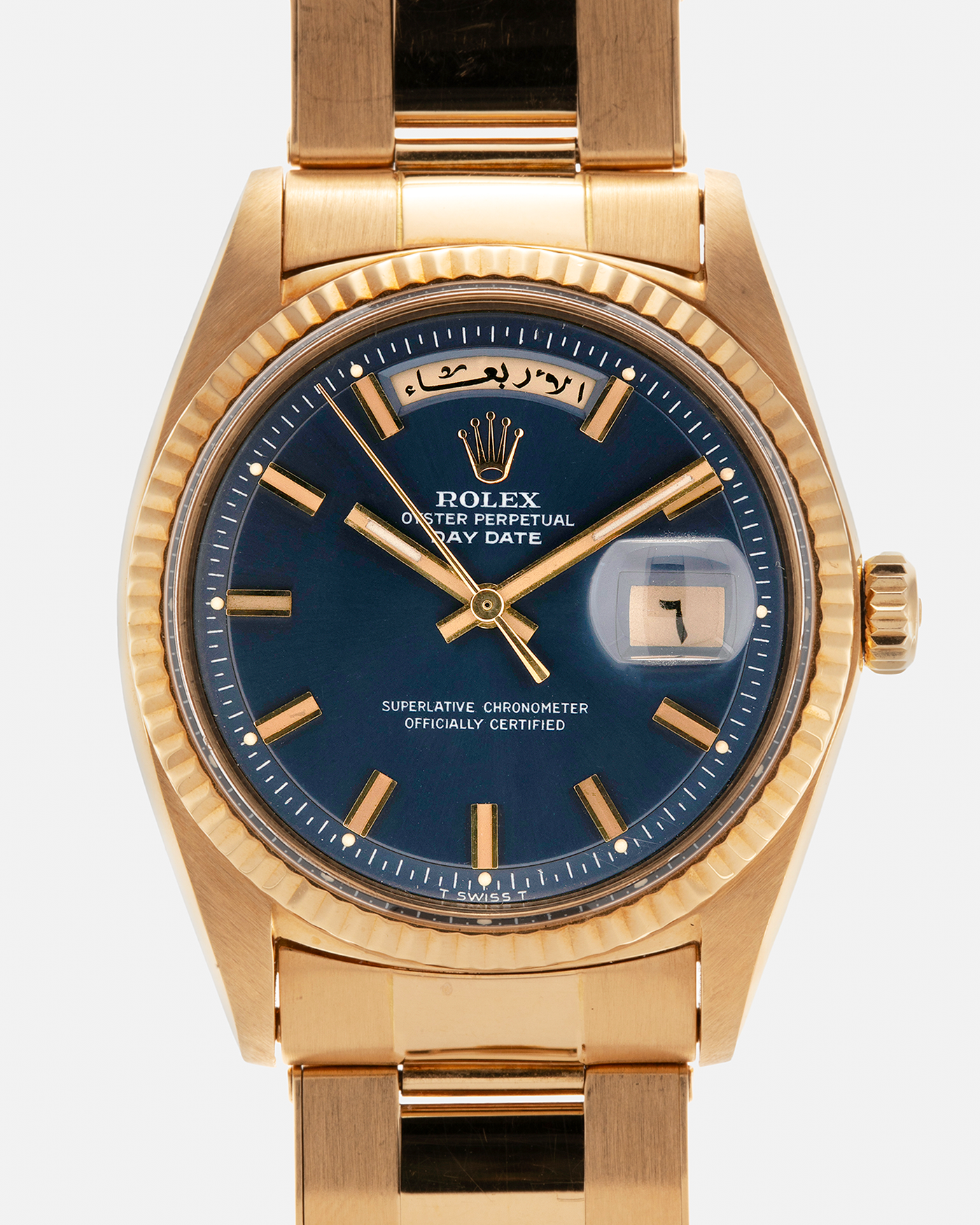 Brand: Rolex
Year: 1971
Model: Day-Date ‘Wide Boy'
Reference Number: 1803
Serial Number: 285XXXX
Material: 18-carat Yellow Gold
Movement: Rolex Cal. 1556, Self-Winding
Case Dimensions: 36mm x 12.5mm (Lug-to-Lug 43mm)
Lug Width: 20mm
Bracelet: Rolex Gay Frères Oyster Rivet Bracelet in 18-carat Yellow Gold with ‘76’ Endlinks and Signed Clasp