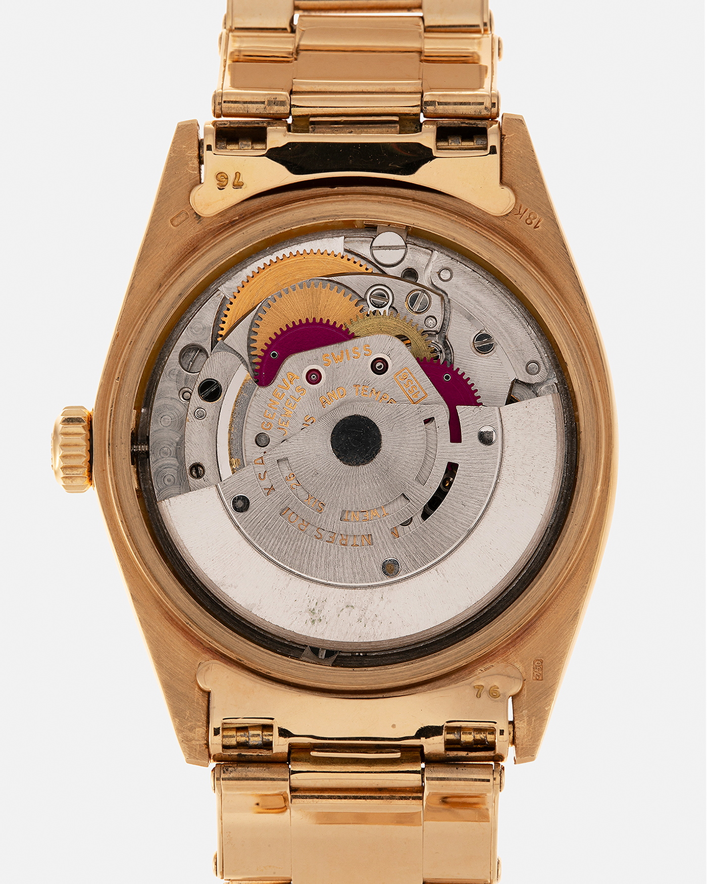 Brand: Rolex
Year: 1971
Model: Day-Date ‘Wide Boy'
Reference Number: 1803
Serial Number: 285XXXX
Material: 18-carat Yellow Gold
Movement: Rolex Cal. 1556, Self-Winding
Case Dimensions: 36mm x 12.5mm (Lug-to-Lug 43mm)
Lug Width: 20mm
Bracelet: Rolex Gay Frères Oyster Rivet Bracelet in 18-carat Yellow Gold with ‘76’ Endlinks and Signed Clasp