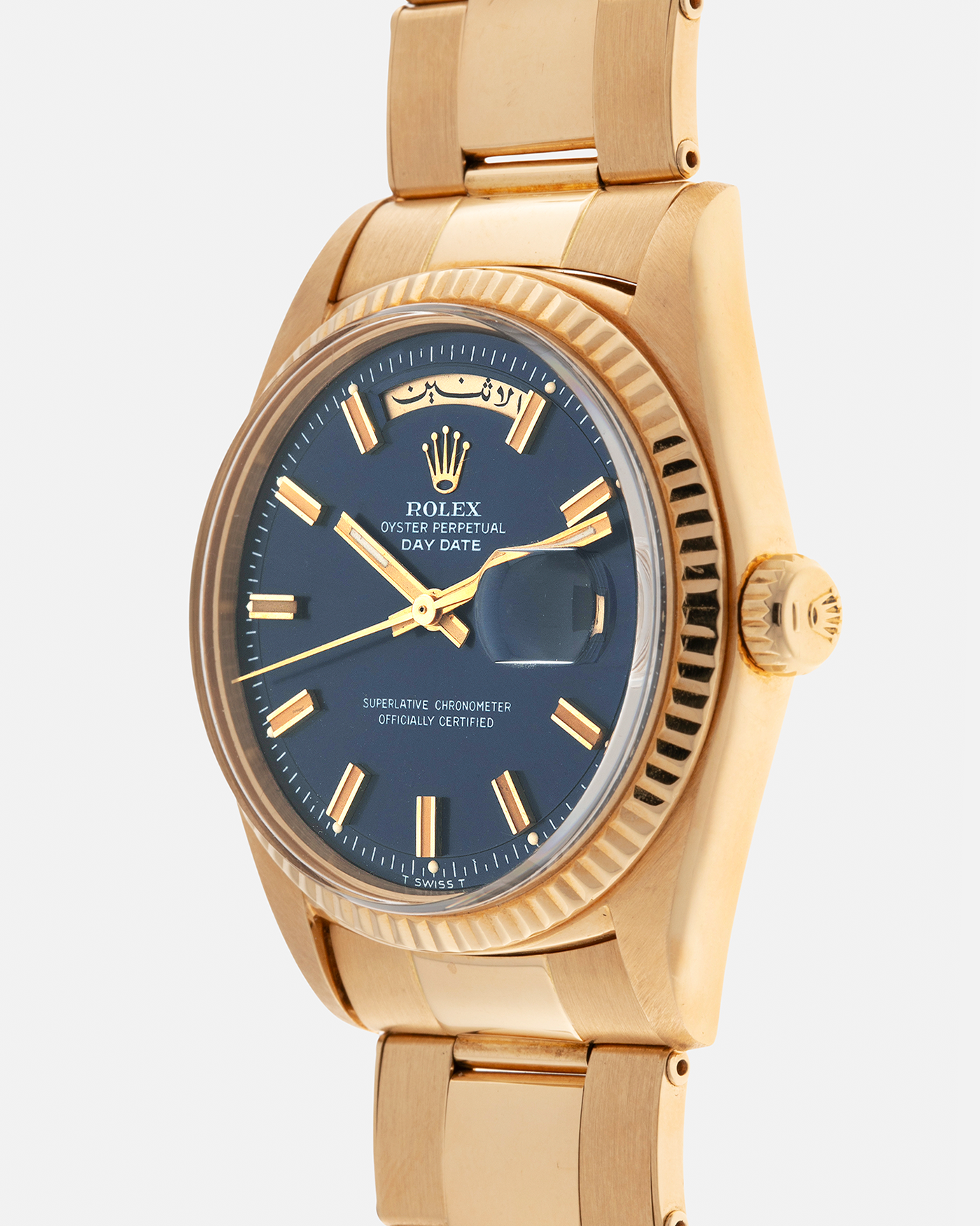 Brand: Rolex
Year: 1971
Model: Day-Date ‘Wide Boy'
Reference Number: 1803
Serial Number: 285XXXX
Material: 18-carat Yellow Gold
Movement: Rolex Cal. 1556, Self-Winding
Case Dimensions: 36mm x 12.5mm (Lug-to-Lug 43mm)
Lug Width: 20mm
Bracelet: Rolex Gay Frères Oyster Rivet Bracelet in 18-carat Yellow Gold with ‘76’ Endlinks and Signed Clasp