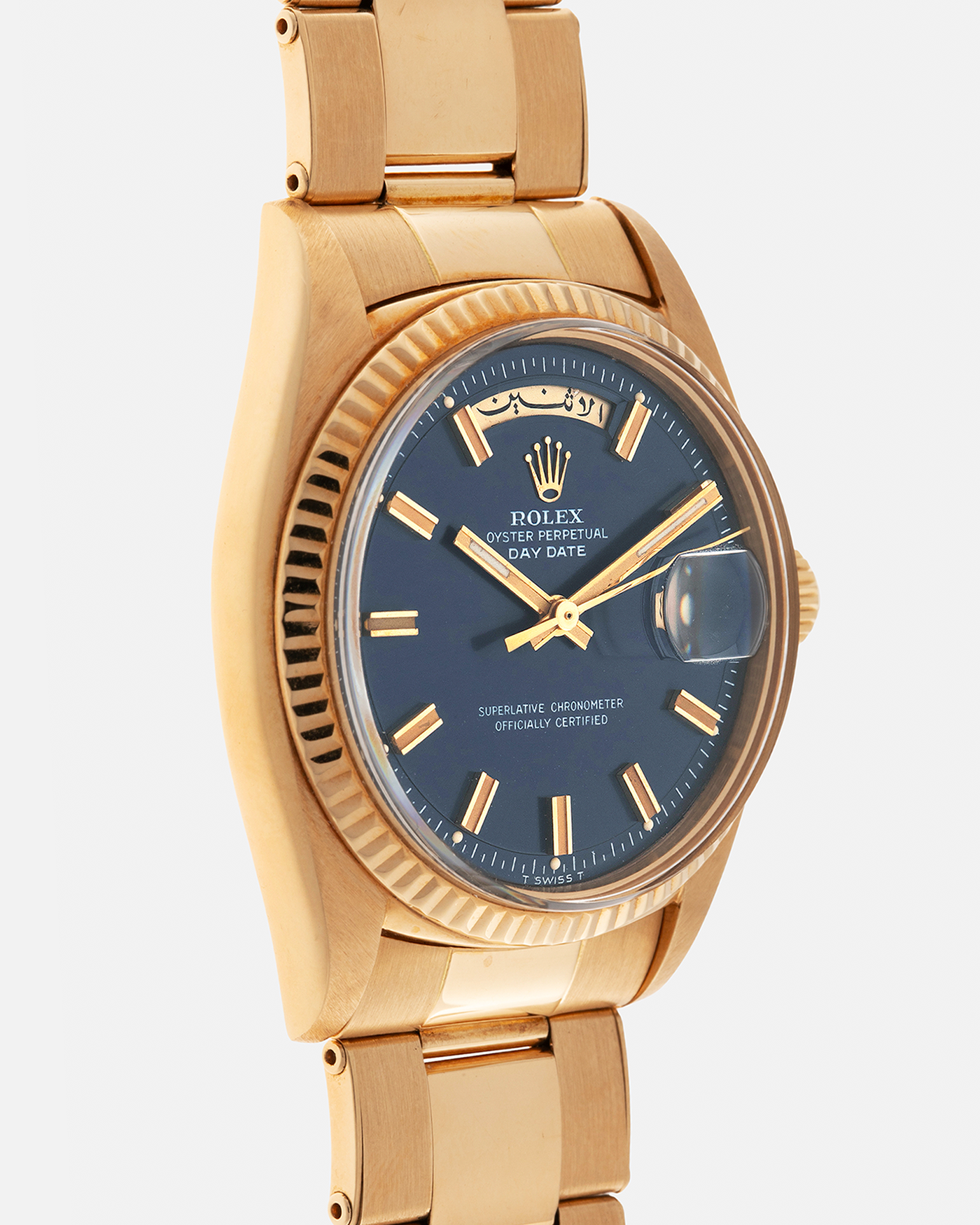 Brand: Rolex
Year: 1971
Model: Day-Date ‘Wide Boy'
Reference Number: 1803
Serial Number: 285XXXX
Material: 18-carat Yellow Gold
Movement: Rolex Cal. 1556, Self-Winding
Case Dimensions: 36mm x 12.5mm (Lug-to-Lug 43mm)
Lug Width: 20mm
Bracelet: Rolex Gay Frères Oyster Rivet Bracelet in 18-carat Yellow Gold with ‘76’ Endlinks and Signed Clasp