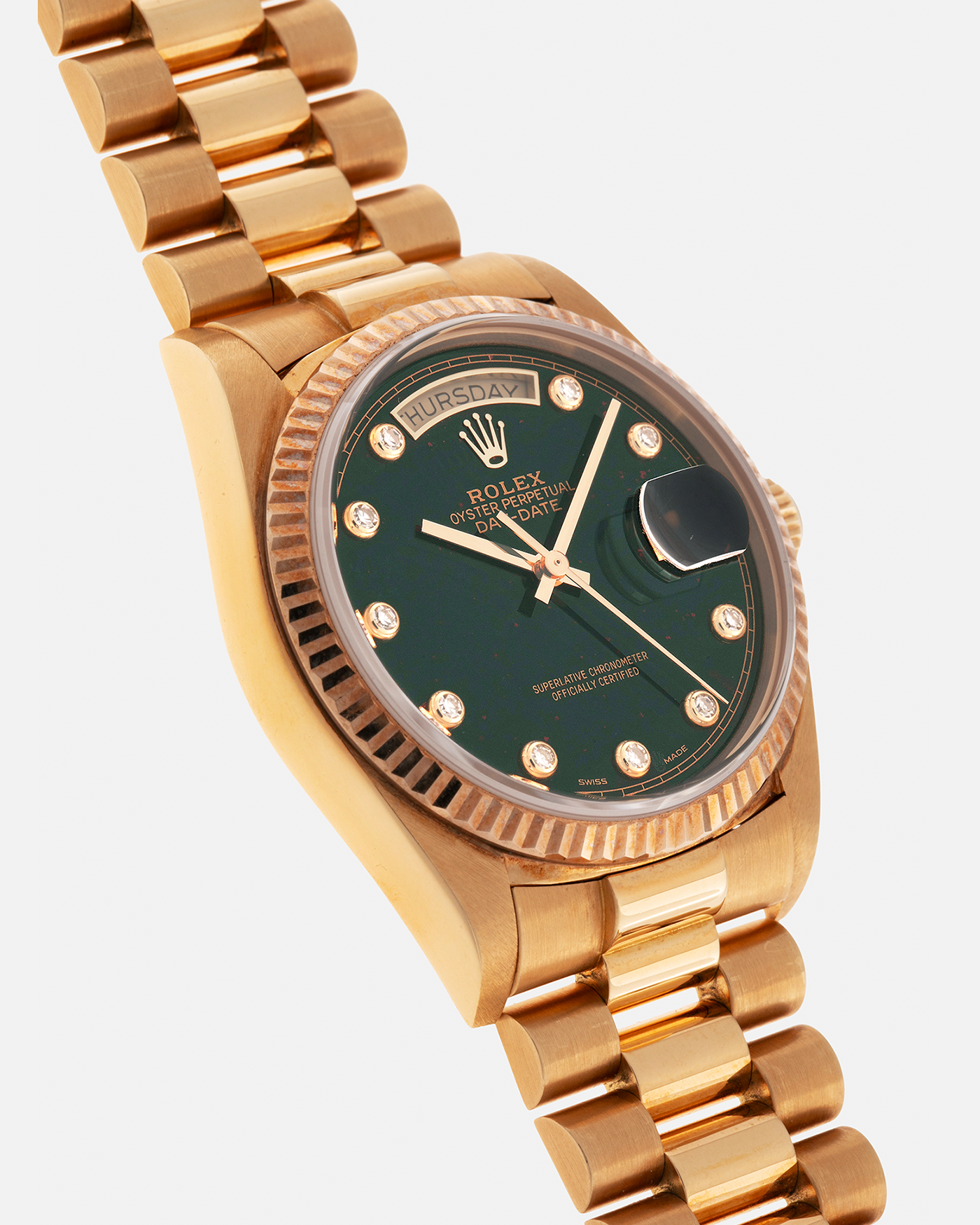 Brand: Rolex
Year: 1987
Model: Day-Date
Reference Number: 18038
Serial Number: 989XXXX
Material: 18-carat Yellow Gold
Movement: Rolex Cal. 3055, Self-Winding
Case Dimensions: 36mm x 12.5mm (Lug-to-Lug 43mm)
Lug Width: 20mm
Bracelet: Rolex Presidential Bracelet in 18-carat Yellow Gold with ‘55’ Curved Endlinks