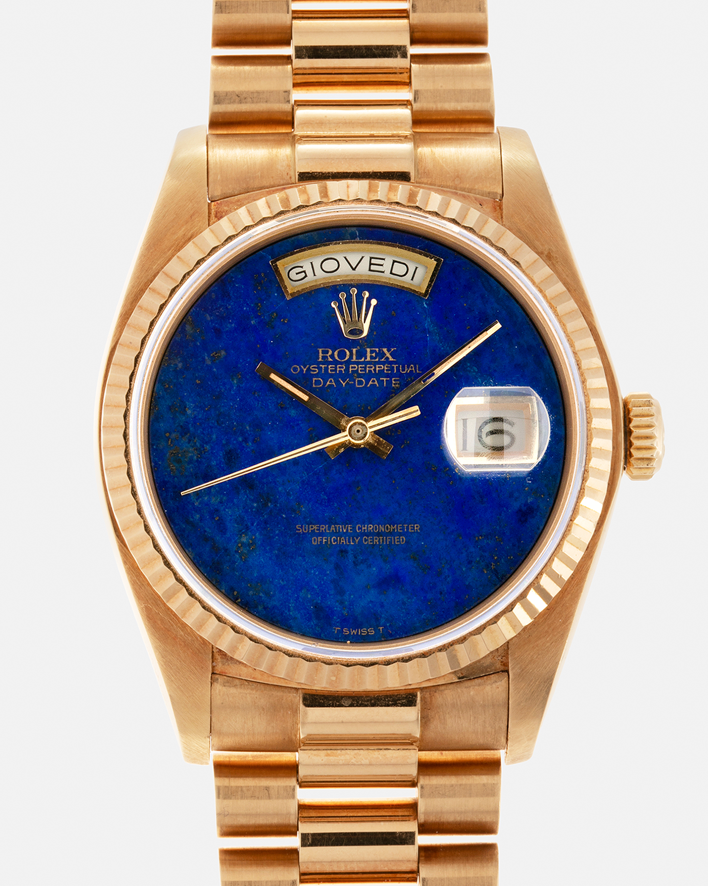 Brand: Rolex Year: 1979 Model: Day-Date, ‘Lapis Lazuli’ Reference Number: 18038 Serial: 612XXXX Material: 18-carat Yellow Gold Movement: Rolex Cal. 3055, Self-Winding Case Diameter: 36mm Lug Width: 20mm Bracelet: Rolex ‘8385’ 18-carat Solid Gold Presidential Bracelet with ‘55’ Curved End Links