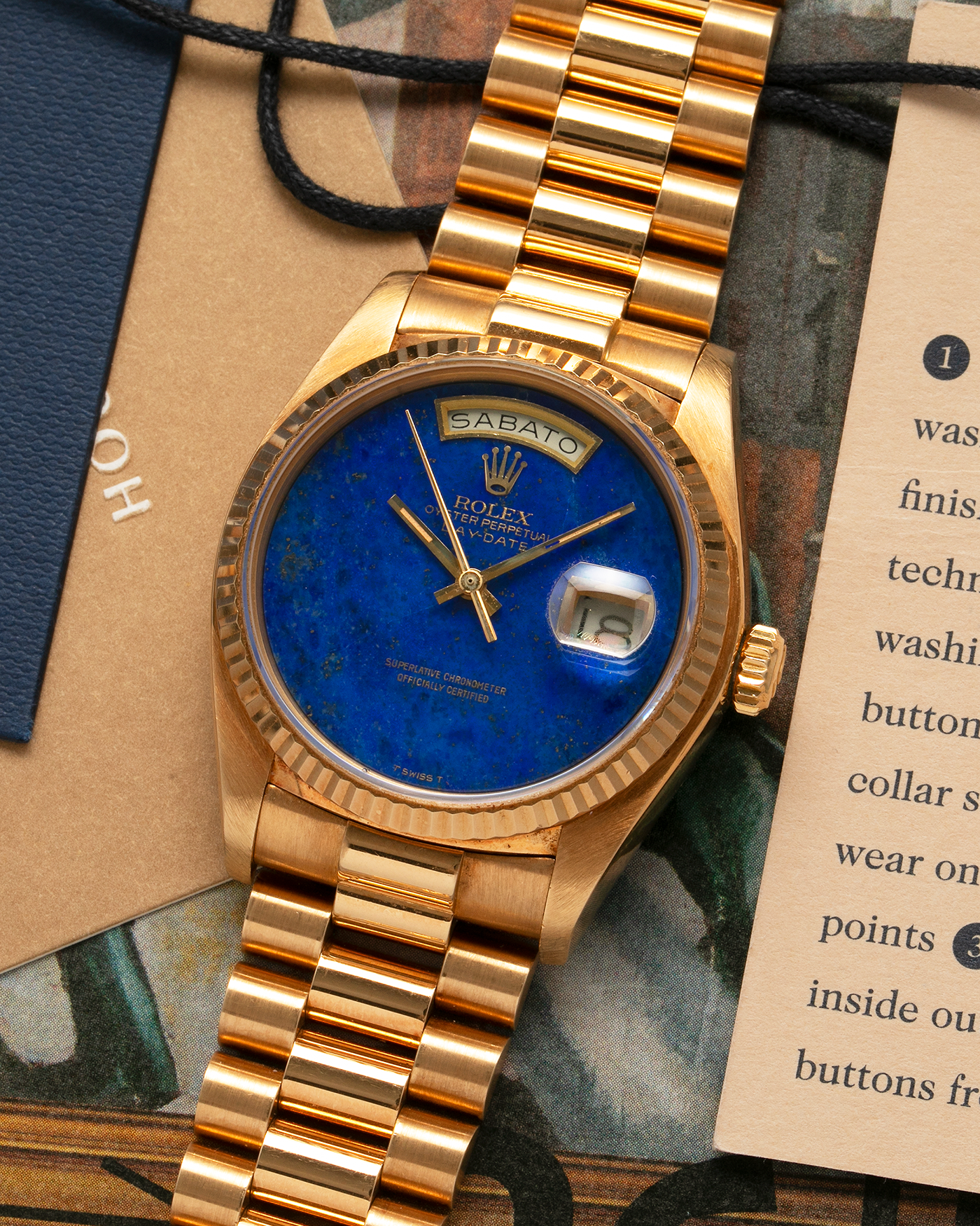 Brand: Rolex Year: 1979 Model: Day-Date, ‘Lapis Lazuli’ Reference Number: 18038 Serial: 612XXXX Material: 18-carat Yellow Gold Movement: Rolex Cal. 3055, Self-Winding Case Diameter: 36mm Lug Width: 20mm Bracelet: Rolex ‘8385’ 18-carat Solid Gold Presidential Bracelet with ‘55’ Curved End Links