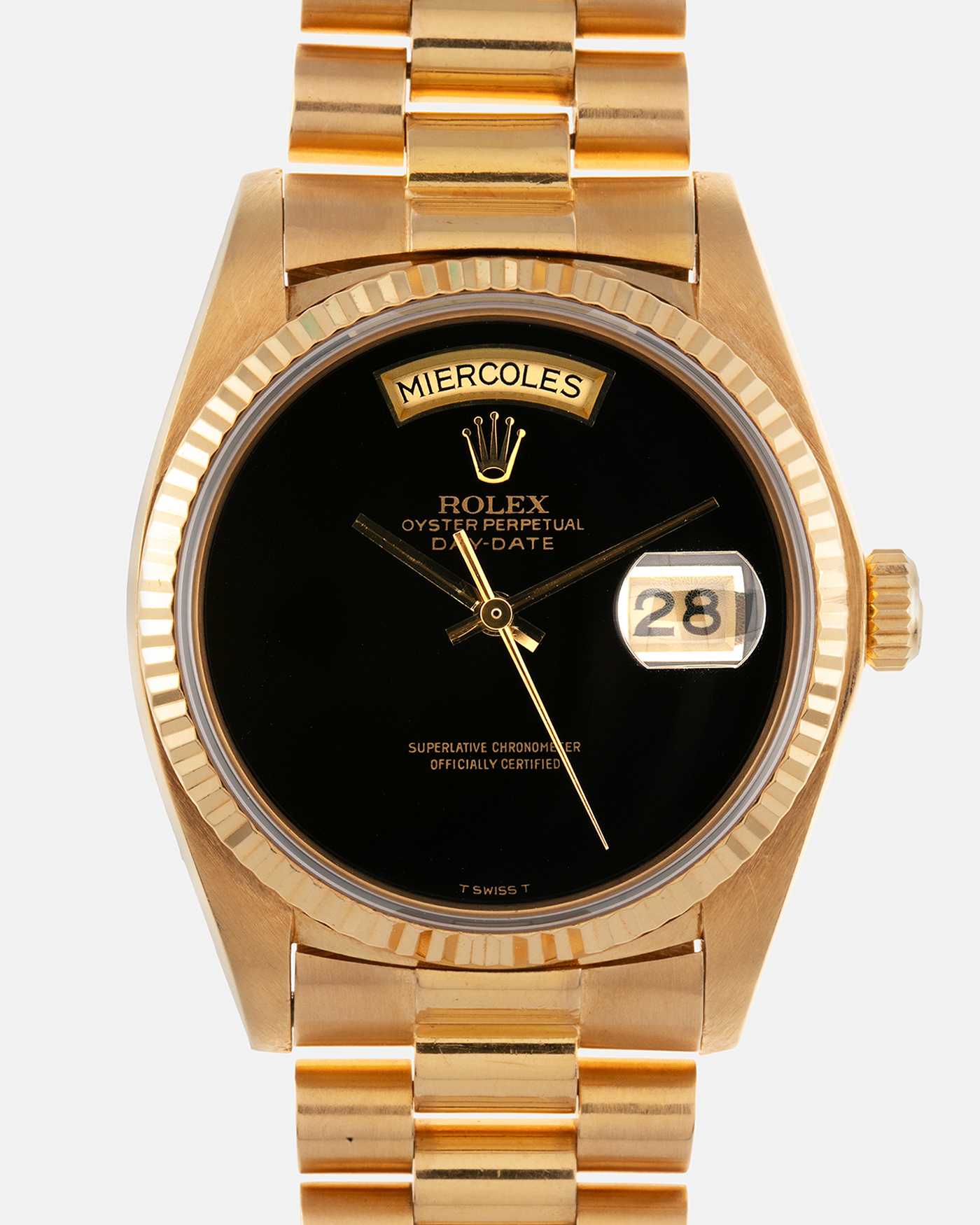 Brand: Rolex Year: 1979 Model: Day-Date, ‘Onyx’ Reference Number: 18038 Serial: 625XXXX Material: 18-carat Yellow Gold, Black Onyx Dial Movement: Rolex Cal. 3055, Self-Winding Case Diameter: 36mm Lug Width: 20mm Bracelet: Rolex ‘8385’ 18-carat Yellow Gold Presidential Bracelet with ‘55’ Curved End Links