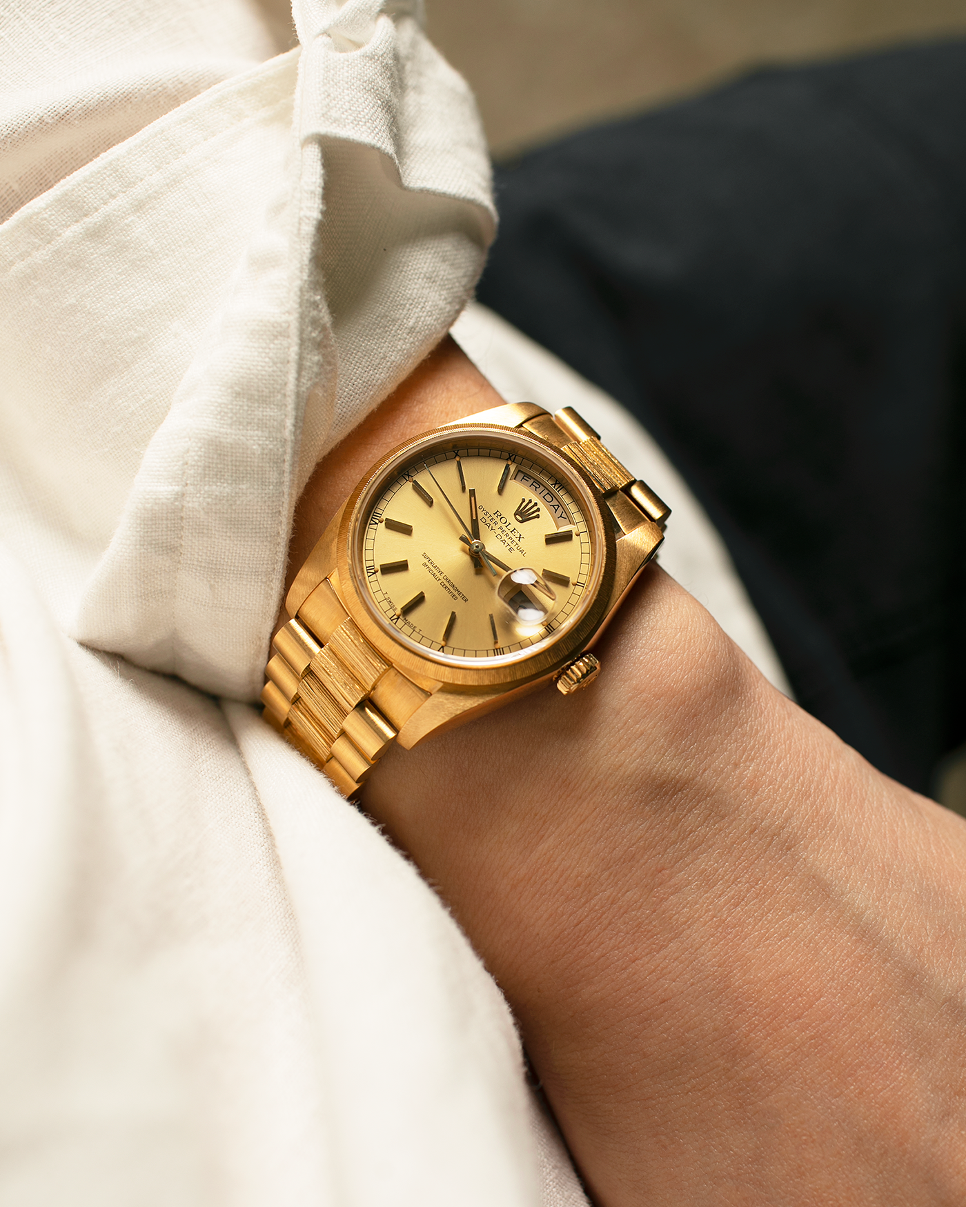 Brand: Rolex
Year: 1984
Model: Day-Date ‘Bark’
Reference Number: 18078
Serial Number: 820XXXX
Material: 18-carat Yellow Gold
Movement: Rolex Cal. 3055, Self-Winding
Case Dimensions: 36mm x 12.5mm (Lug-to-Lug 43mm)
Lug Width: 20mm
Bracelet: Rolex Presidential 8723 ‘Bark’ Bracelet with Signed 18-carat Yellow Gold Folding Clasp