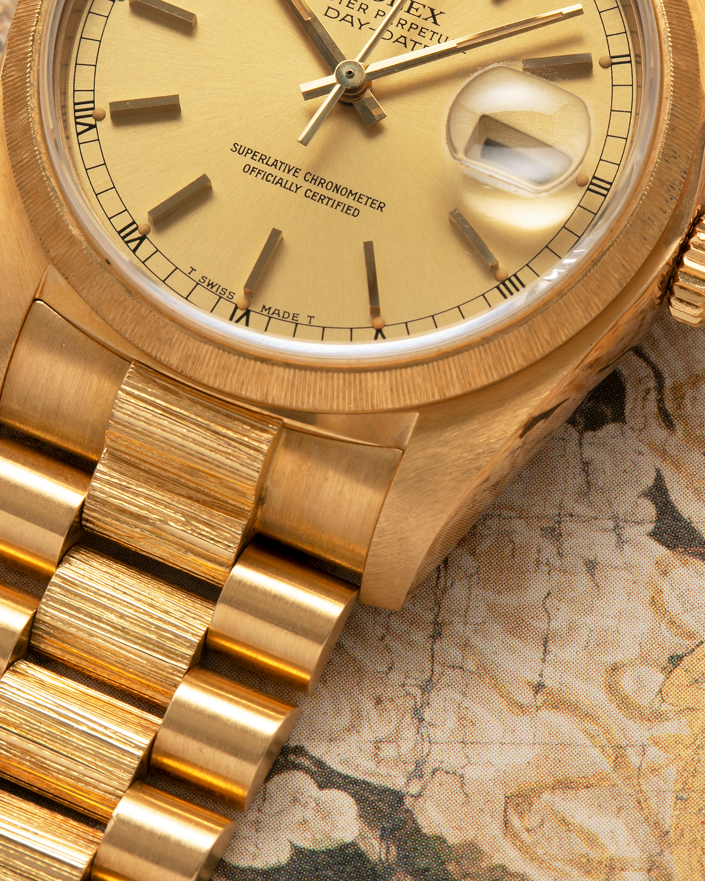 Brand: Rolex
Year: 1984
Model: Day-Date ‘Bark’
Reference Number: 18078
Serial Number: 820XXXX
Material: 18-carat Yellow Gold
Movement: Rolex Cal. 3055, Self-Winding
Case Dimensions: 36mm x 12.5mm (Lug-to-Lug 43mm)
Lug Width: 20mm
Bracelet: Rolex Presidential 8723 ‘Bark’ Bracelet with Signed 18-carat Yellow Gold Folding Clasp
