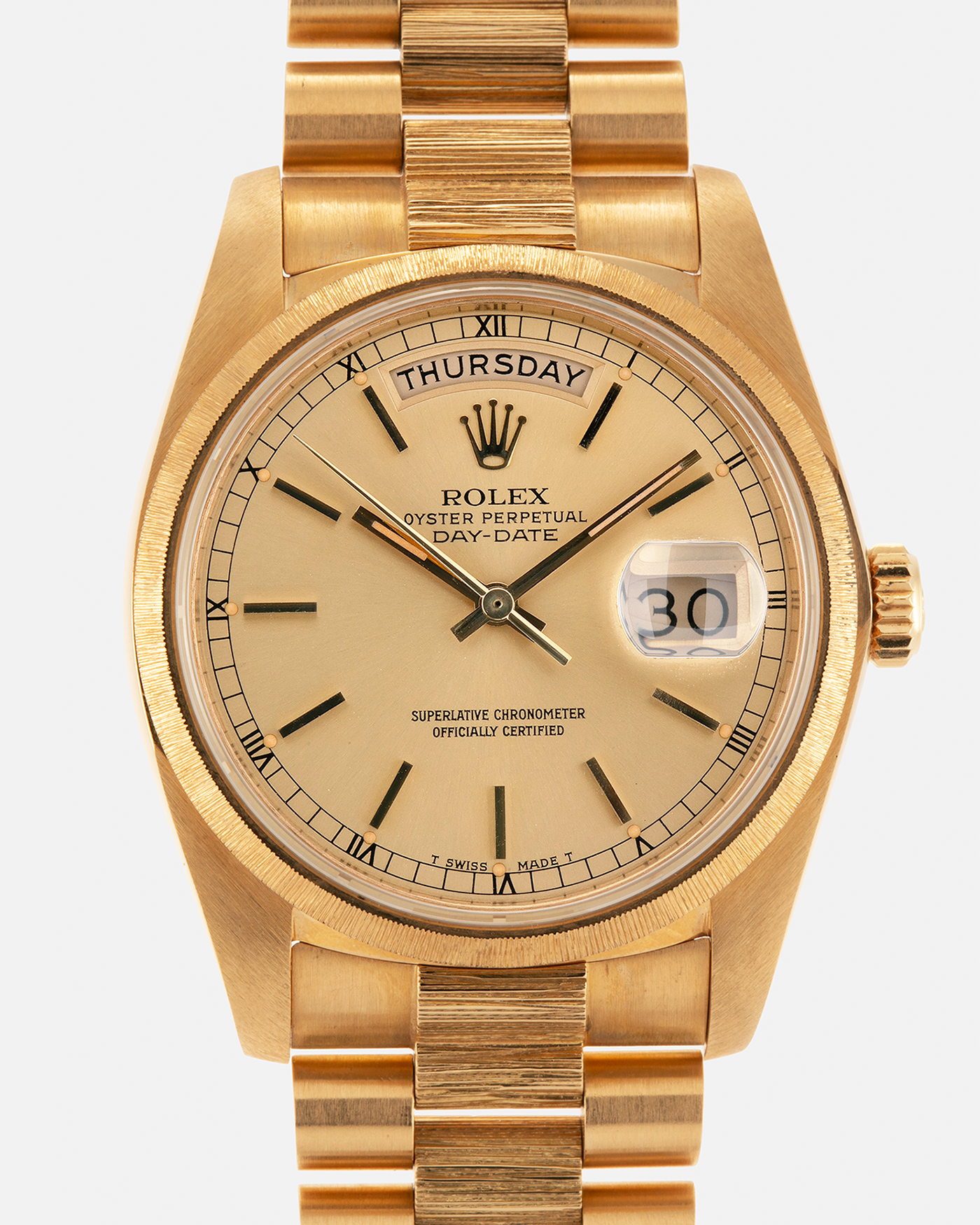 Brand: Rolex
Year: 1984
Model: Day-Date ‘Bark’
Reference Number: 18078
Serial Number: 820XXXX
Material: 18-carat Yellow Gold
Movement: Rolex Cal. 3055, Self-Winding
Case Dimensions: 36mm x 12.5mm (Lug-to-Lug 43mm)
Lug Width: 20mm
Bracelet: Rolex Presidential 8723 ‘Bark’ Bracelet with Signed 18-carat Yellow Gold Folding Clasp