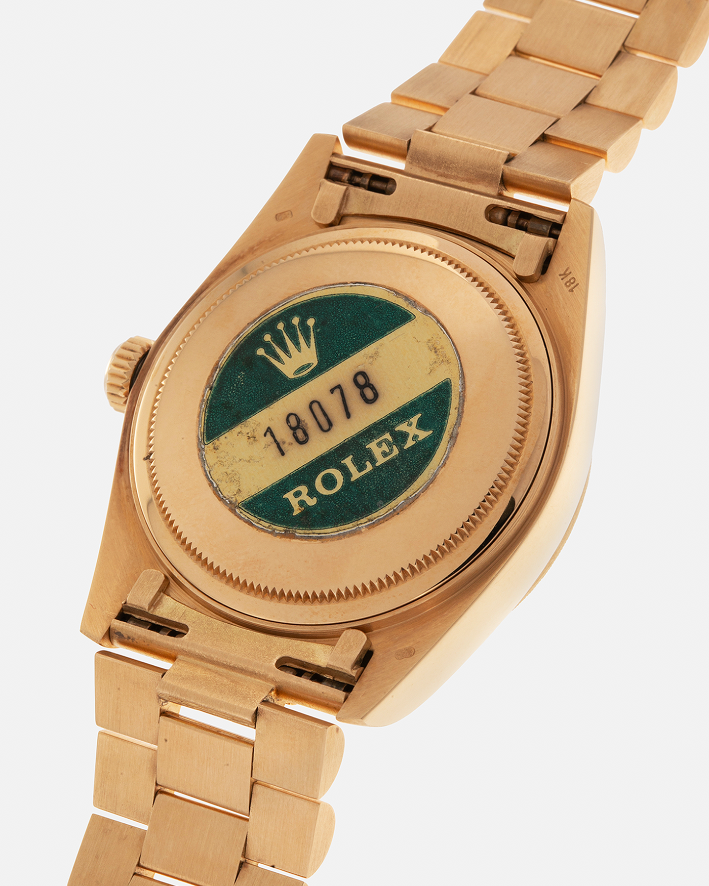 Brand: Rolex
Year: 1984
Model: Day-Date ‘Bark’
Reference Number: 18078
Serial Number: 820XXXX
Material: 18-carat Yellow Gold
Movement: Rolex Cal. 3055, Self-Winding
Case Dimensions: 36mm x 12.5mm (Lug-to-Lug 43mm)
Lug Width: 20mm
Bracelet: Rolex Presidential 8723 ‘Bark’ Bracelet with Signed 18-carat Yellow Gold Folding Clasp