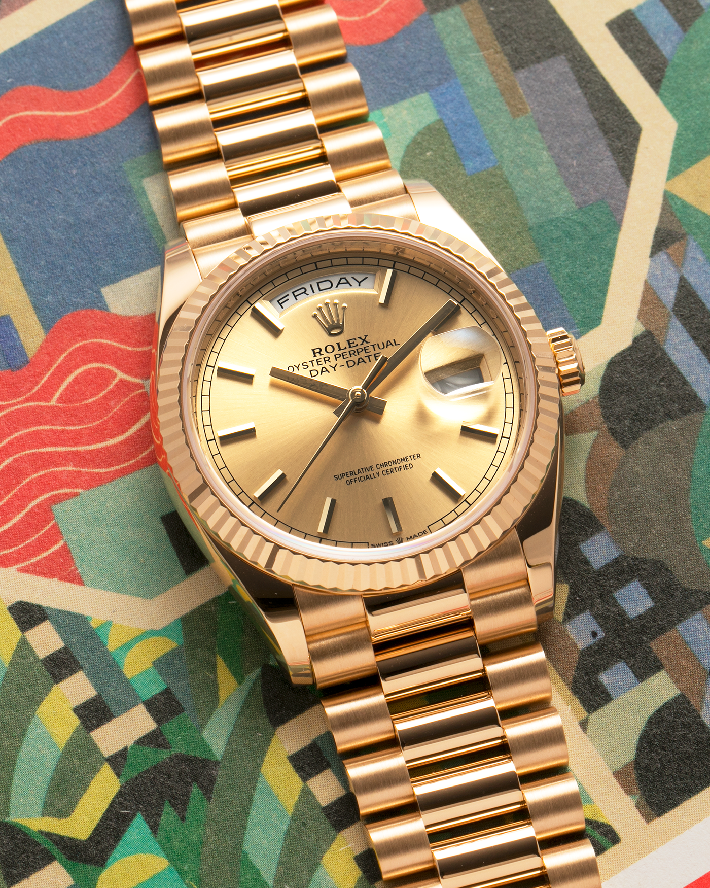 Brand: Rolex
Year: 2020
Model: Day-Date 36 ‘Champagne Dial’
Reference Number: 128238
Material: 18-carat Yellow Gold
Movement: Rolex Cal. 3255, Self-Winding
Case Dimensions: 36mm x 12mm (Lug-to-Lug 43mm)
Lug Width: 20mm
Bracelet: Rolex Presidential Bracelet in 18-carat Yellow Gold with Signed Folding Clasp