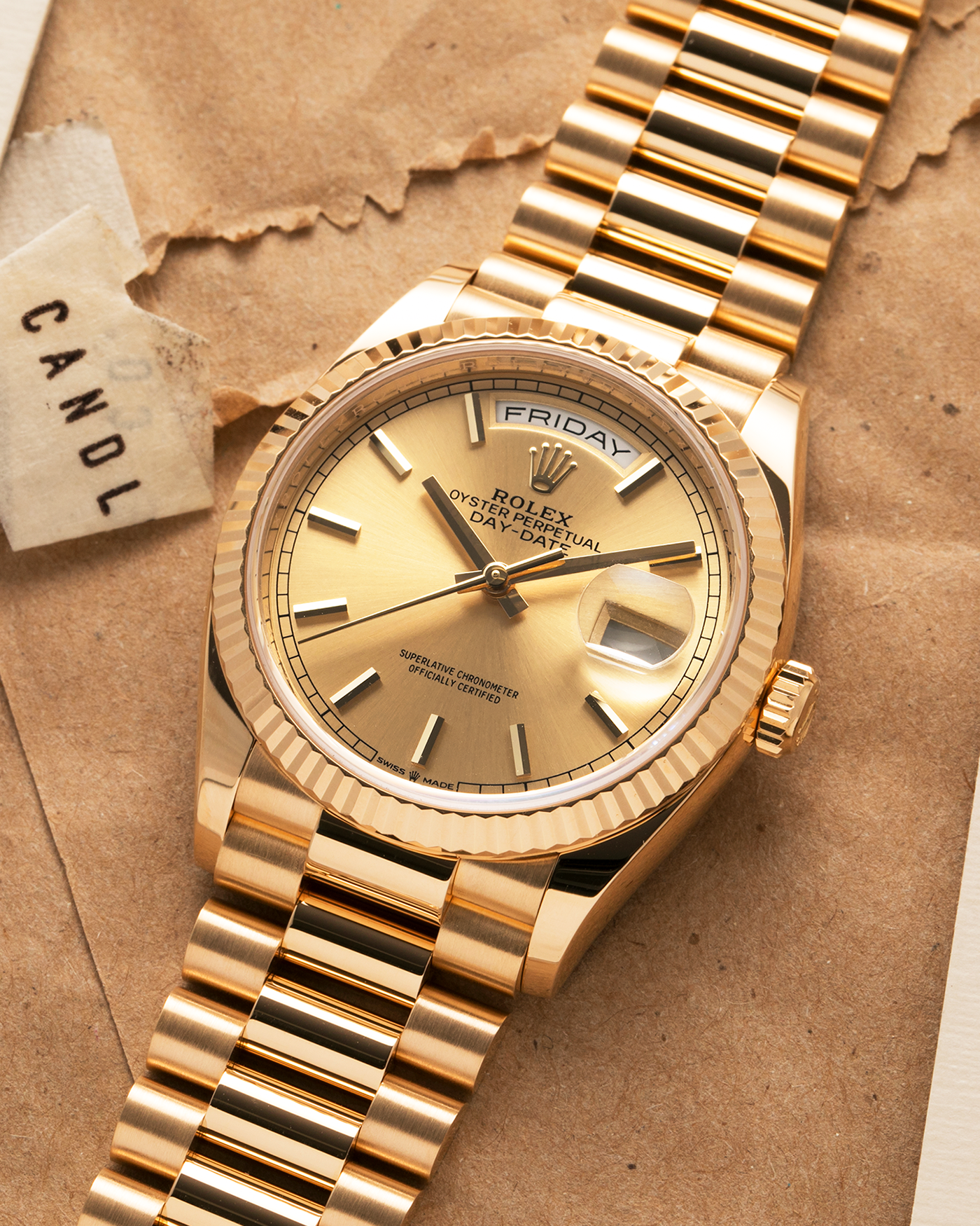 Brand: Rolex
Year: 2020
Model: Day-Date 36 ‘Champagne Dial’
Reference Number: 128238
Material: 18-carat Yellow Gold
Movement: Rolex Cal. 3255, Self-Winding
Case Dimensions: 36mm x 12mm (Lug-to-Lug 43mm)
Lug Width: 20mm
Bracelet: Rolex Presidential Bracelet in 18-carat Yellow Gold with Signed Folding Clasp