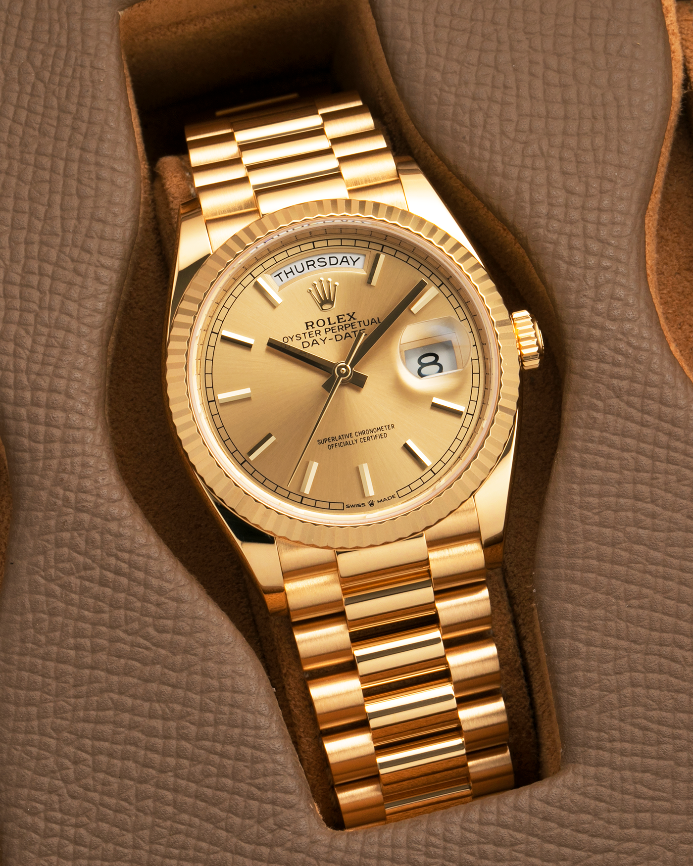 Brand: Rolex
Year: 2020
Model: Day-Date 36 ‘Champagne Dial’
Reference Number: 128238
Material: 18-carat Yellow Gold
Movement: Rolex Cal. 3255, Self-Winding
Case Dimensions: 36mm x 12mm (Lug-to-Lug 43mm)
Lug Width: 20mm
Bracelet: Rolex Presidential Bracelet in 18-carat Yellow Gold with Signed Folding Clasp
