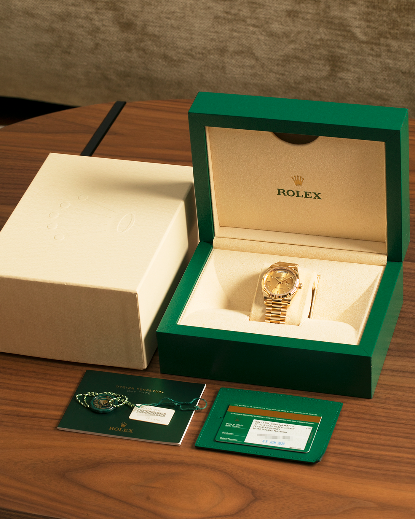 Brand: Rolex
Year: 2020
Model: Day-Date 36 ‘Champagne Dial’
Reference Number: 128238
Material: 18-carat Yellow Gold
Movement: Rolex Cal. 3255, Self-Winding
Case Dimensions: 36mm x 12mm (Lug-to-Lug 43mm)
Lug Width: 20mm
Bracelet: Rolex Presidential Bracelet in 18-carat Yellow Gold with Signed Folding Clasp