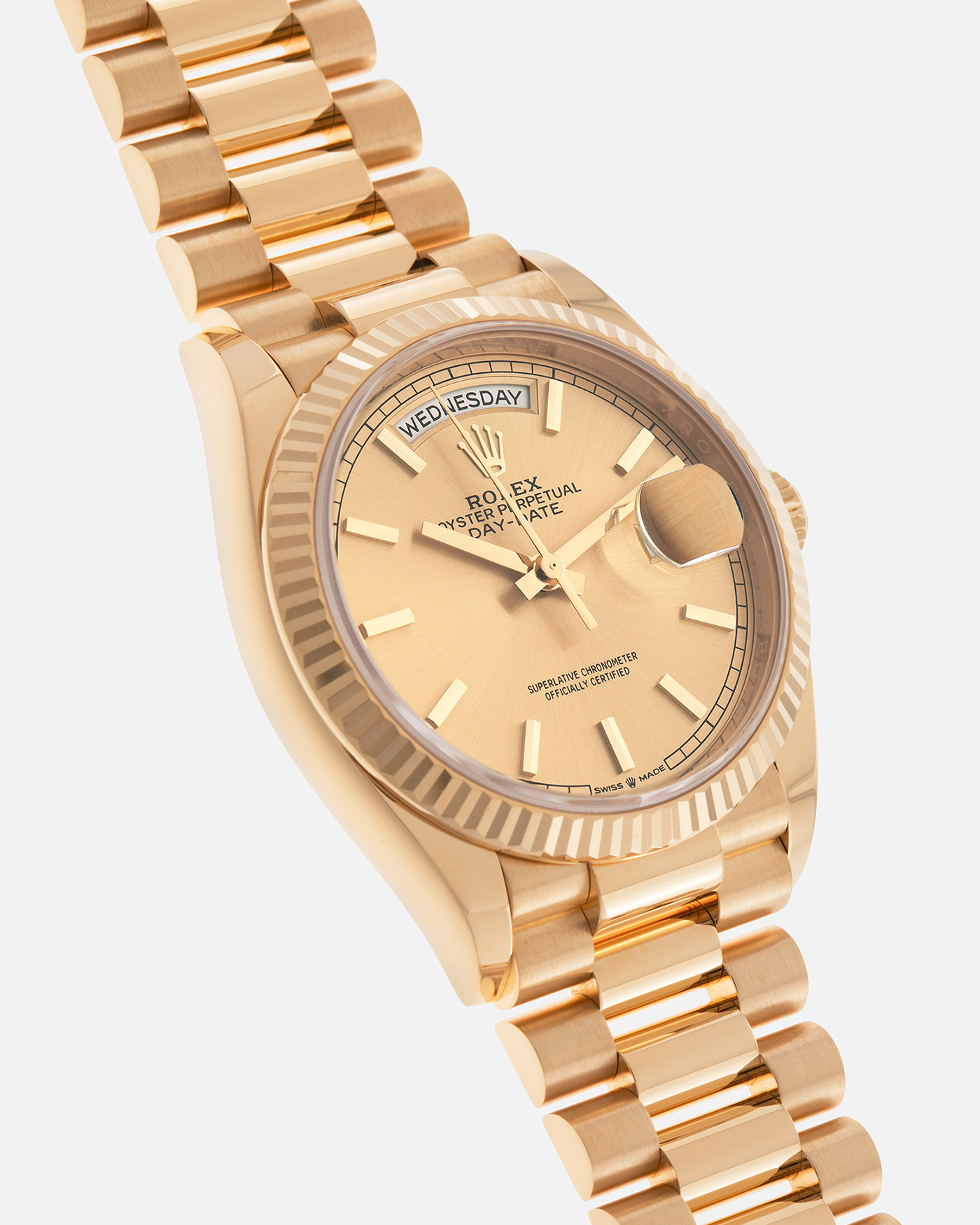 Brand: Rolex
Year: 2020
Model: Day-Date 36 ‘Champagne Dial’
Reference Number: 128238
Material: 18-carat Yellow Gold
Movement: Rolex Cal. 3255, Self-Winding
Case Dimensions: 36mm x 12mm (Lug-to-Lug 43mm)
Lug Width: 20mm
Bracelet: Rolex Presidential Bracelet in 18-carat Yellow Gold with Signed Folding Clasp