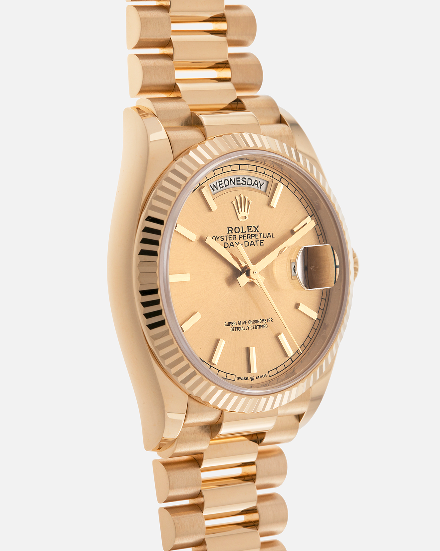 Brand: Rolex
Year: 2020
Model: Day-Date 36 ‘Champagne Dial’
Reference Number: 128238
Material: 18-carat Yellow Gold
Movement: Rolex Cal. 3255, Self-Winding
Case Dimensions: 36mm x 12mm (Lug-to-Lug 43mm)
Lug Width: 20mm
Bracelet: Rolex Presidential Bracelet in 18-carat Yellow Gold with Signed Folding Clasp