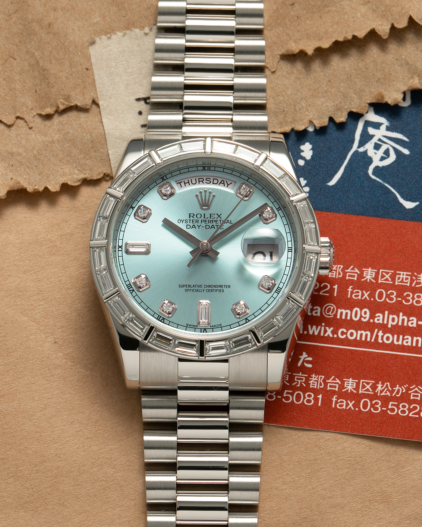 Brand: Rolex Year: 2010s Model: Day-Date 36 ‘Ice Blue’ Baguette Bezel Reference Number: 118366 Material: Platinum 950 Case, Factory Set Baguette Diamond Bezel and Diamond Hour Markers Movement: Rolex Cal. 3155, Self-Winding Case Diameter: 36mm Bracelet: Rolex Presidential Bracelet in Platinum 950