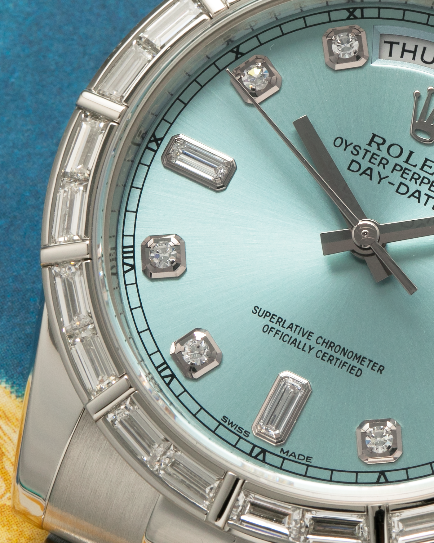 Brand: Rolex Year: 2010s Model: Day-Date 36 ‘Ice Blue’ Baguette Bezel Reference Number: 118366 Material: Platinum 950 Case, Factory Set Baguette Diamond Bezel and Diamond Hour Markers Movement: Rolex Cal. 3155, Self-Winding Case Diameter: 36mm Bracelet: Rolex Presidential Bracelet in Platinum 950