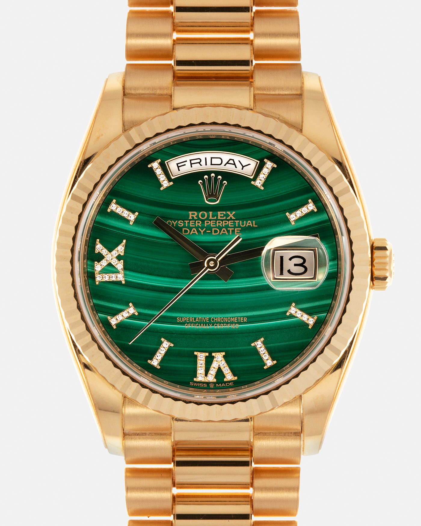 Brand: Rolex Year: 2021 Model: Day-Date 36 ‘Malachite Diamond’ Reference Number: 128238 Serial Number: 6H47XXXX Material: 18-carat Yellow Gold Case, Green Malachite Dial, Factory Set Diamond Roman-Style Hour Markers Movement: Rolex Cal. 3255, Self-Winding Case Diameter: 36mm Bracelet: Rolex Presidential Bracelet in 18-carat Yellow Gold