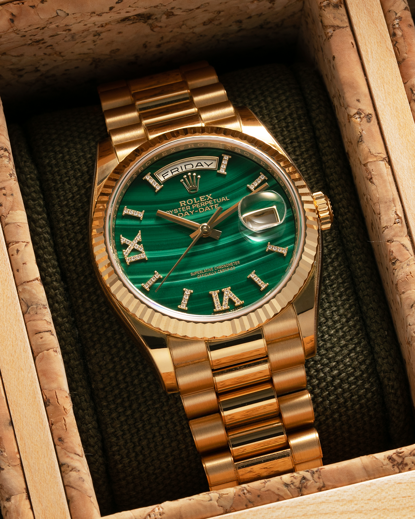 Brand: Rolex Year: 2021 Model: Day-Date 36 ‘Malachite Diamond’ Reference Number: 128238 Serial Number: 6H47XXXX Material: 18-carat Yellow Gold Case, Green Malachite Dial, Factory Set Diamond Roman-Style Hour Markers Movement: Rolex Cal. 3255, Self-Winding Case Diameter: 36mm Bracelet: Rolex Presidential Bracelet in 18-carat Yellow Gold