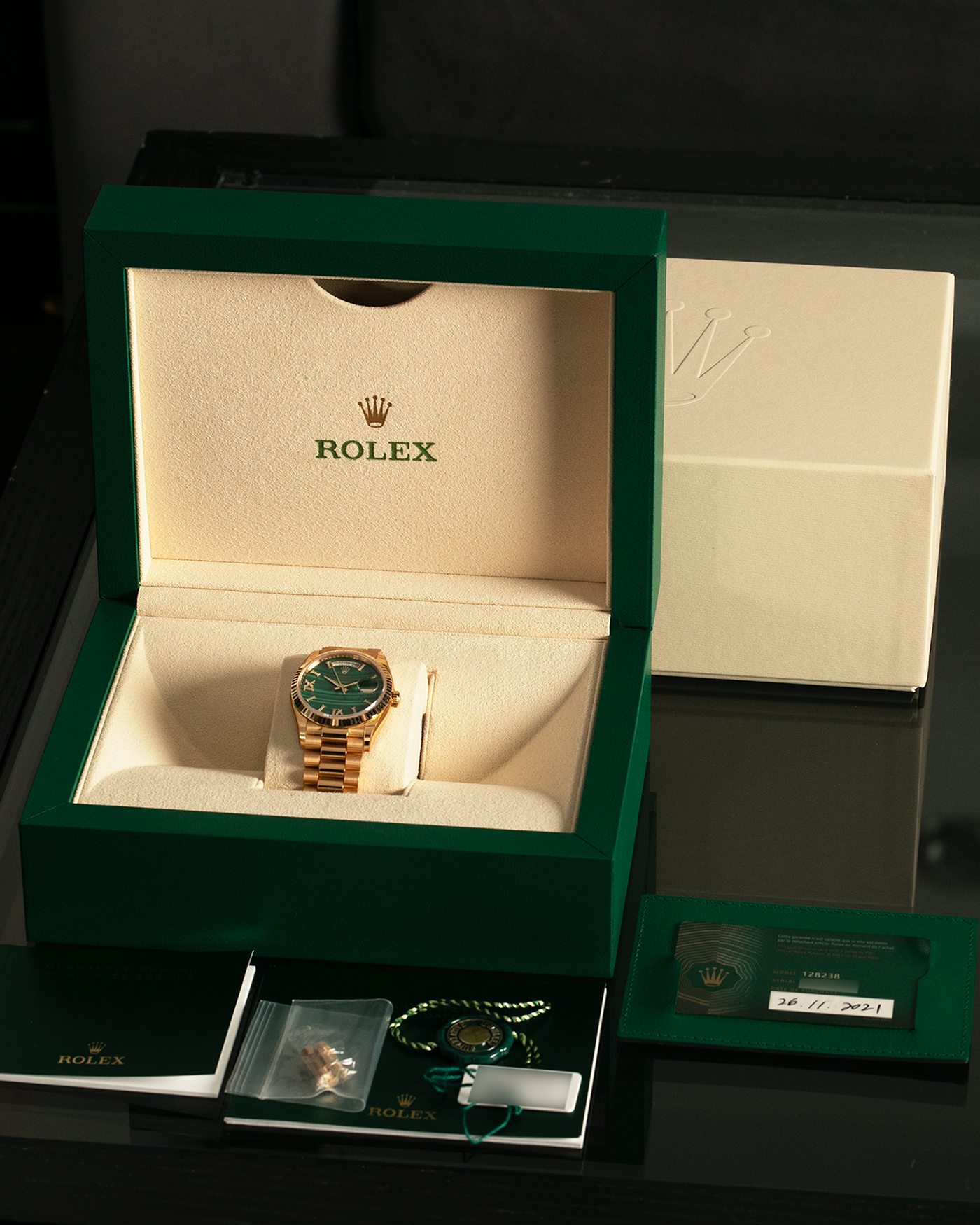 Brand: Rolex Year: 2021 Model: Day-Date 36 ‘Malachite Diamond’ Reference Number: 128238 Serial Number: 6H47XXXX Material: 18-carat Yellow Gold Case, Green Malachite Dial, Factory Set Diamond Roman-Style Hour Markers Movement: Rolex Cal. 3255, Self-Winding Case Diameter: 36mm Bracelet: Rolex Presidential Bracelet in 18-carat Yellow Gold