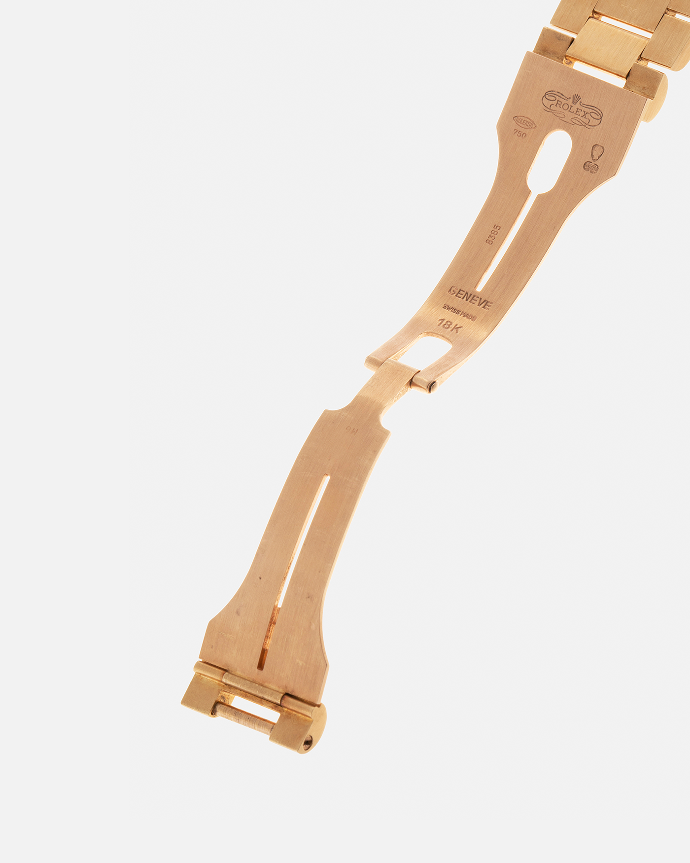 Brand: Rolex
Year: 1979
Model: Day-Date
Reference Number: 18038
Serial: 6217XXX
Material: 18-carat Yellow Gold
Movement: Rolex Cal. 3055, Self-Winding
Case Diameter: 36mm x 12mm (43mm Lug-to-Lug)
Lug Width: 20mm
Bracelet:  Rolex ‘8385’ 18-carat Yellow Gold Presidential Bracelet with ‘55’ Curved End Links and Signed Clasp